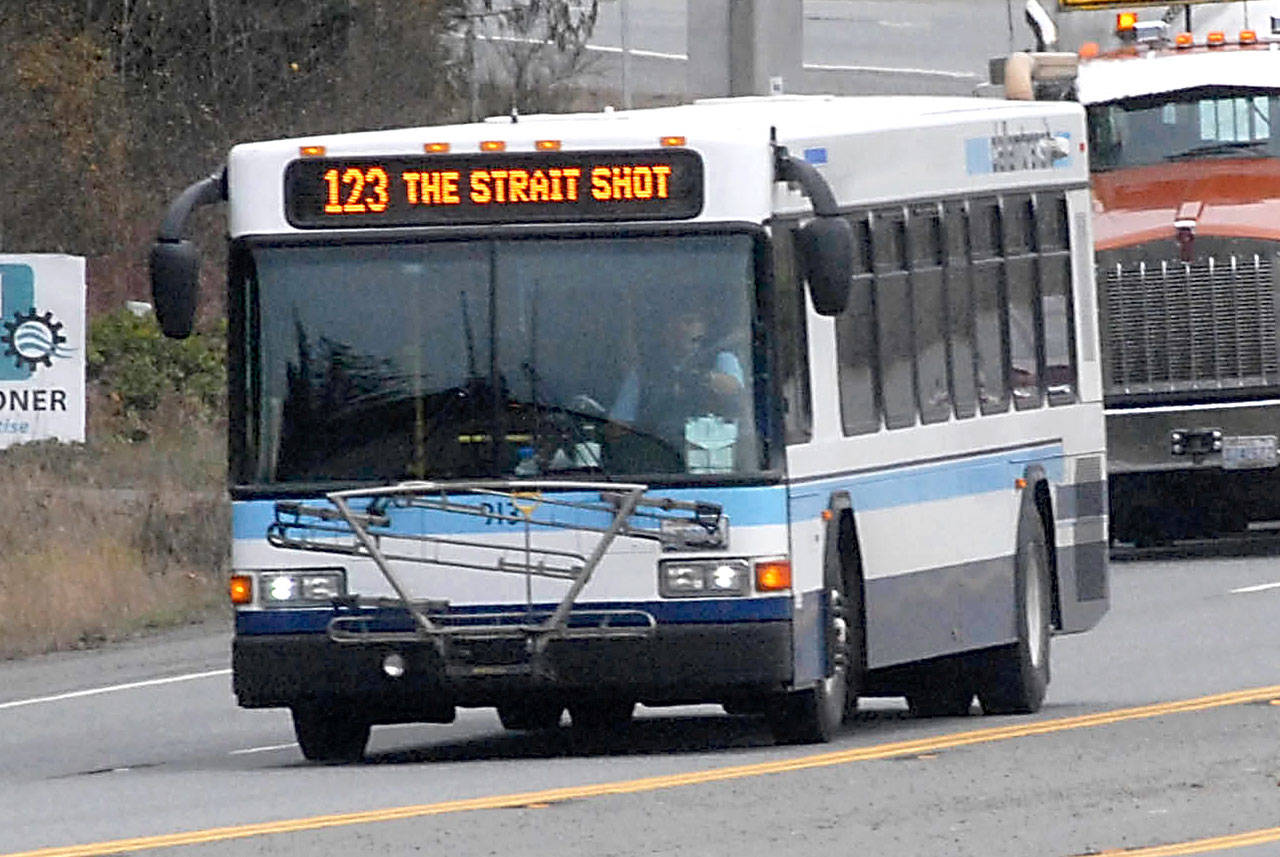 Clallam Transit’s Strait Shot bus approaches Port Angeles on U.S. Highway 101 on a recent run from the Bainbridge Island ferry terminal. Photo by Keith Thorpe/Peninsula Daily News