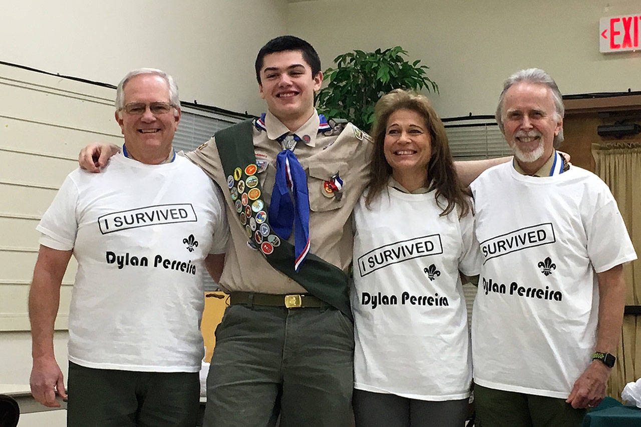 New Sequim Eagle Scout Dylan Perreira stands with his Scoutmasters Rene Nadon with Troop 90, on left, Debbie Crane and Michael Cobb with Troop 1492 in sporty new shirts care of Dylan’s mom Emily Morse. Sequim Gazette photos by Matthew Nash