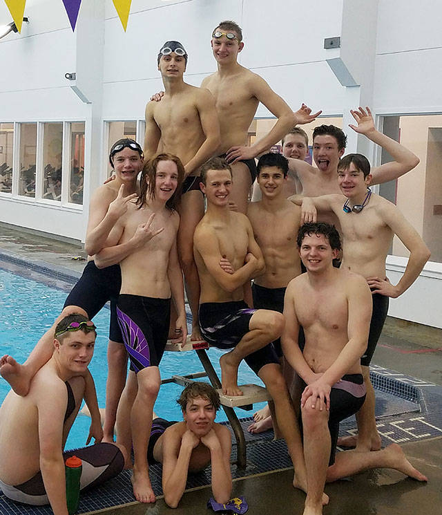 Boys swimming: Wolves quartet sets school 400 free relay mark in district prep meet