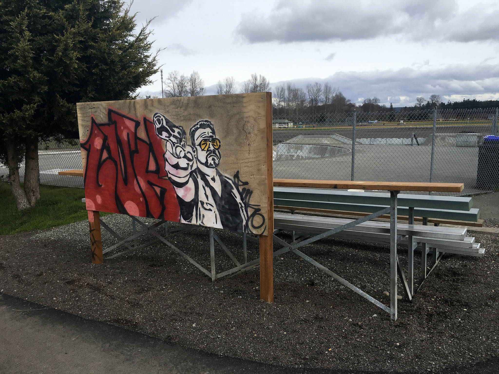 City of Sequim staff say a graffiti board at the Sequim Skate Park has mostly deterred graffiti in the park since late 2012. However a recent image depicting a gun has angered locals leading city staff to enact a policy to paint over the board every two weeks. Sequim Gazette photo by Matthew Nash