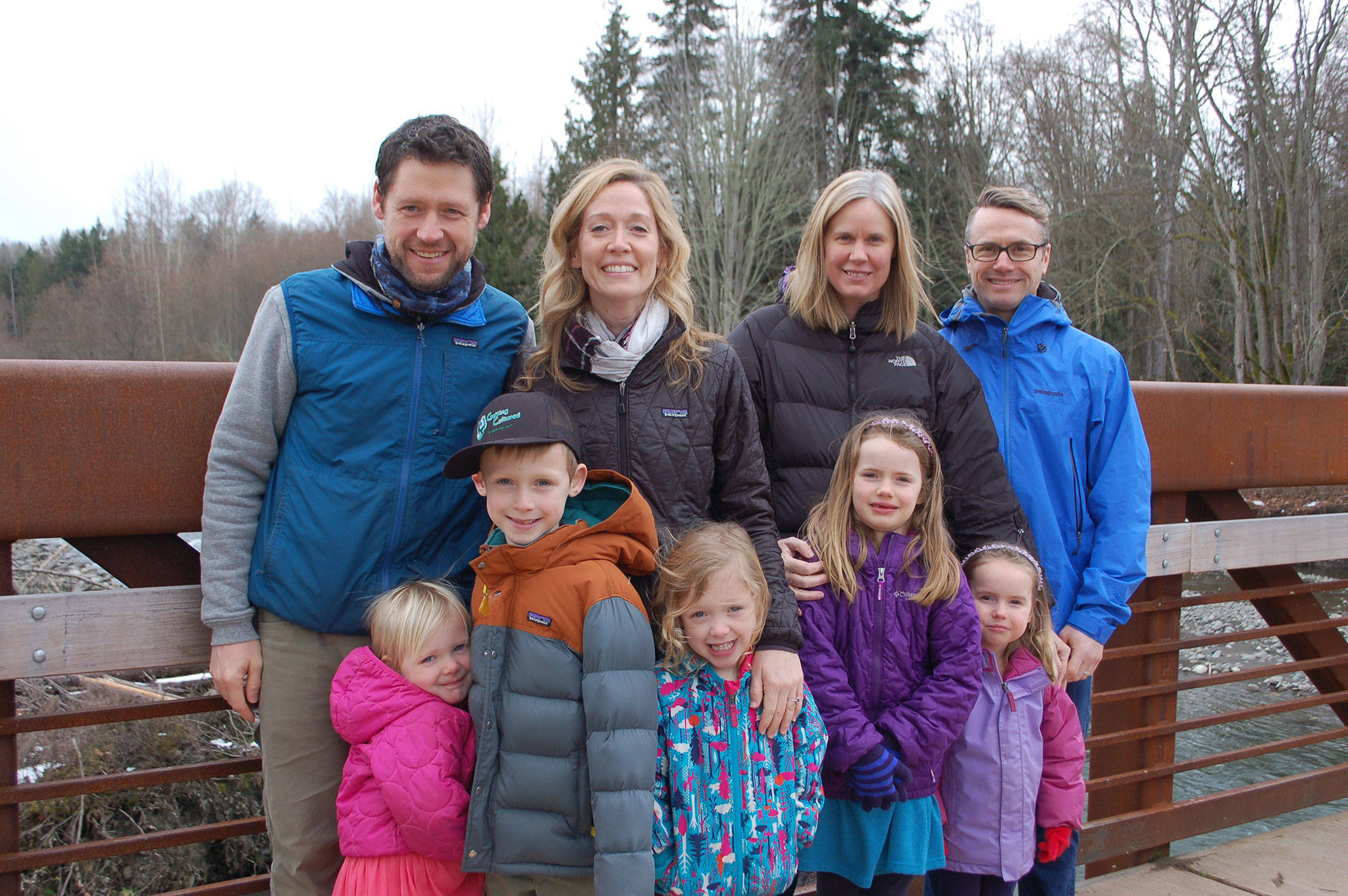 Two families own and operate Getting Cultured, a business in Sequim that ferments local foods and distributes its products across the Olympic Peninsula and in Tacoma. From back left, are co-owners AJ Wooten, Lindsey Wooten, Ginger Voyles, Greg Voyles, and front left, Ruby Wooten, Tyler Wooten, and Ava Wooten, Gwyneth Voyles and Gretchen Voyles. Sequim Gazette photo by Erin Hawkins