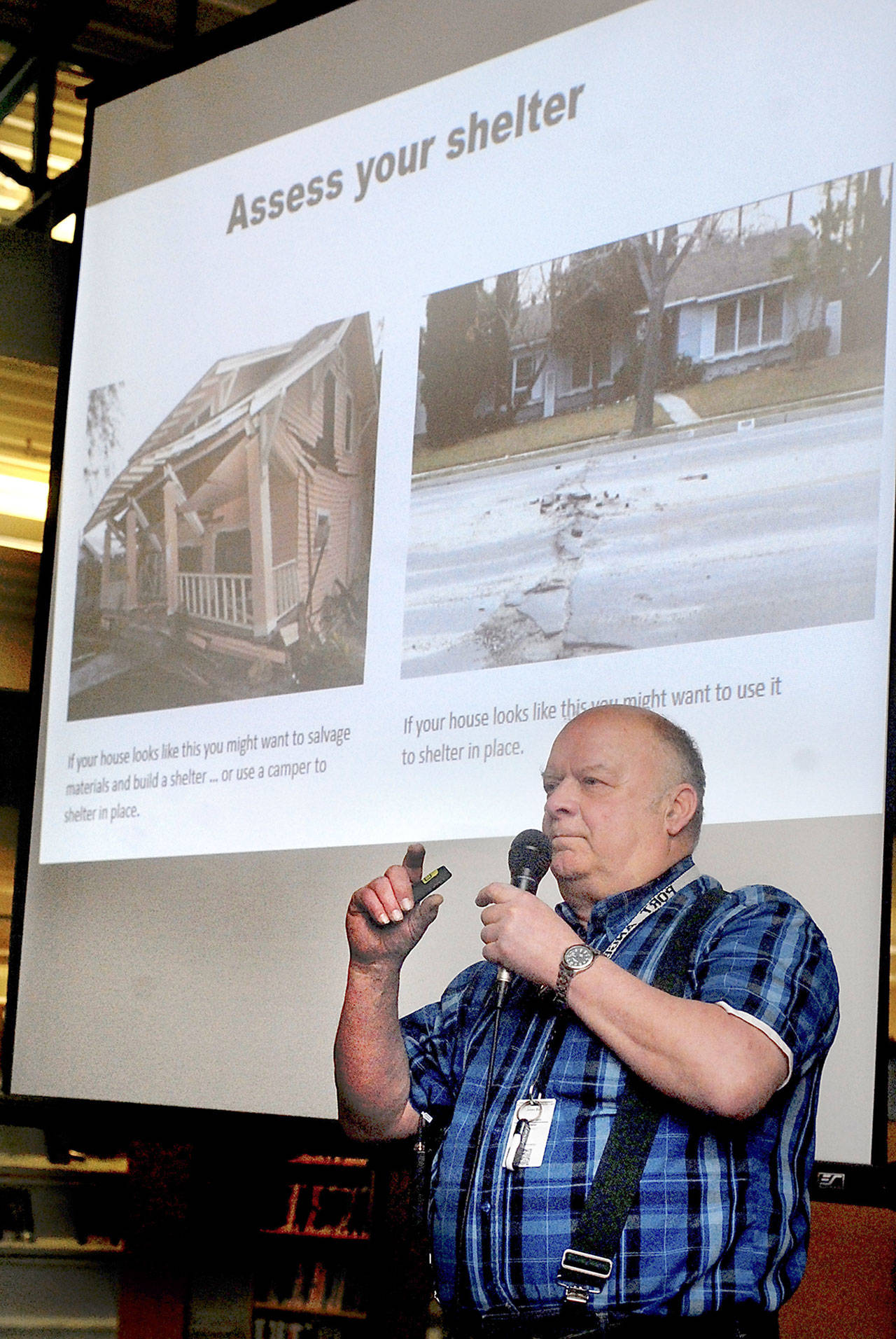 Earthquake-preparedness advocate and former state legislator Jim Buck of Joyce gives a presentation at the Port Angeles Public Library in January on how to prepare for a large Cascadia quake. Photo by Keith Thorpe/Peninsula Daily News