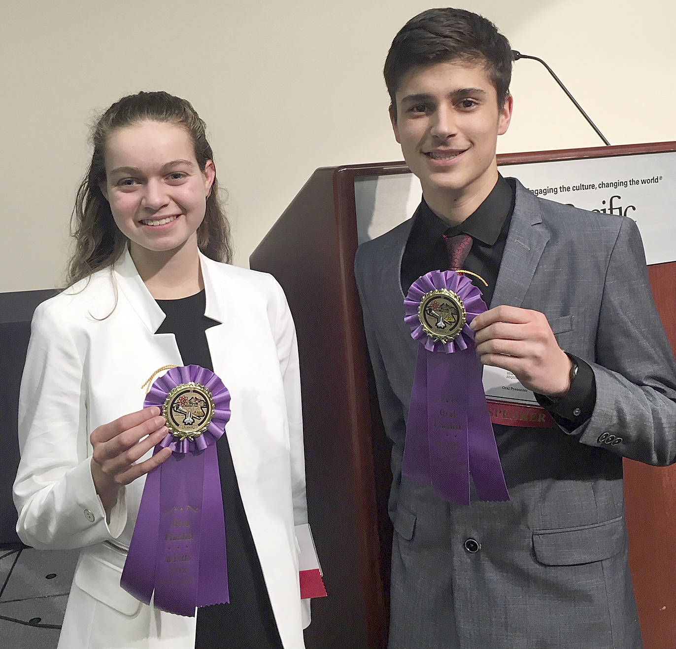 Sequim High School students Vita Olson and Sean Weber take a break from competition at the Washington Junior Science and Humanities Symposium, held in mid-March at Seattle Pacific University. Submitted photos