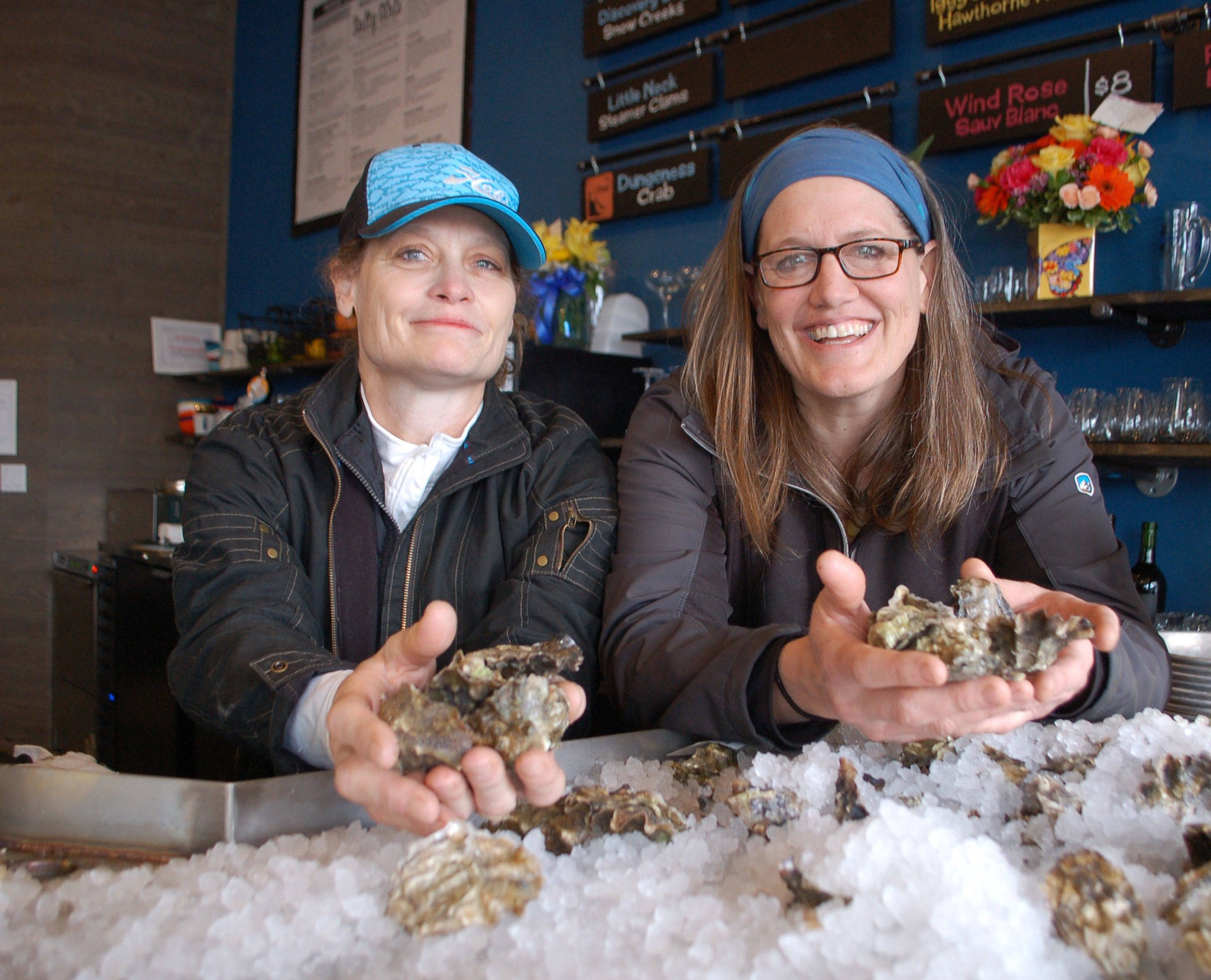 Salty Girls Sequim Seafood Co. owners and life partners Lavon Gones, left, and Tracie Millett opened their oyster bar and restaurant on April 6 and are ready to serve the Sequim community. Sequim Gazette photo by Erin Hawkins