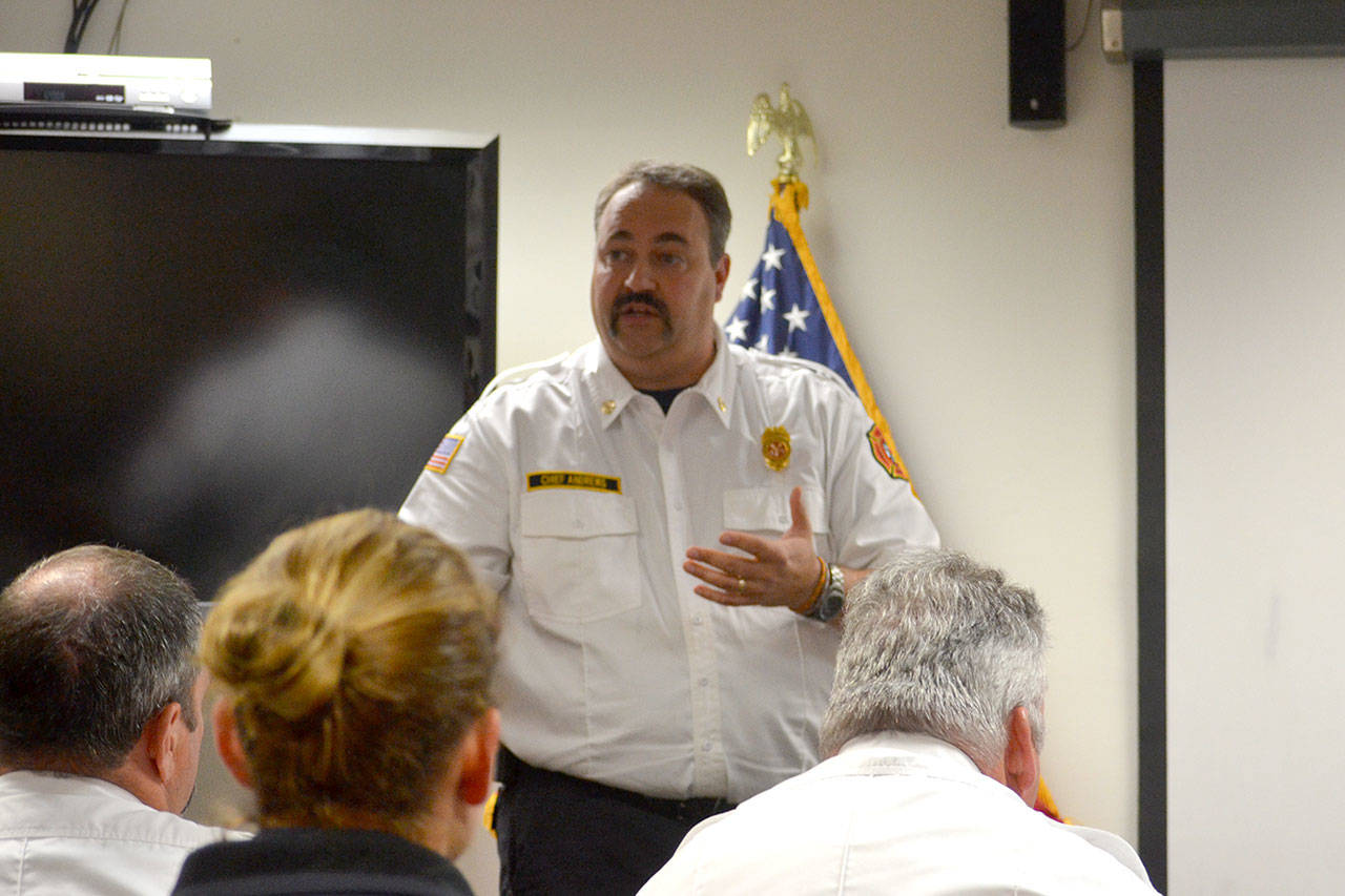 Fire Chief Ben Andrews for Clallam County Fire District 3 speaks in September 2017 at a fire commissioners’ special meeting about options whether or not fire commissioners accept a federal grant to help pay wages and benefits for six firefighters over three years. However, fire commissioners opted not to accept the grant on Sept. 19 because they felt it would put the district in a tough financial situation. Sequim Gazette file photo by Matthew Nash