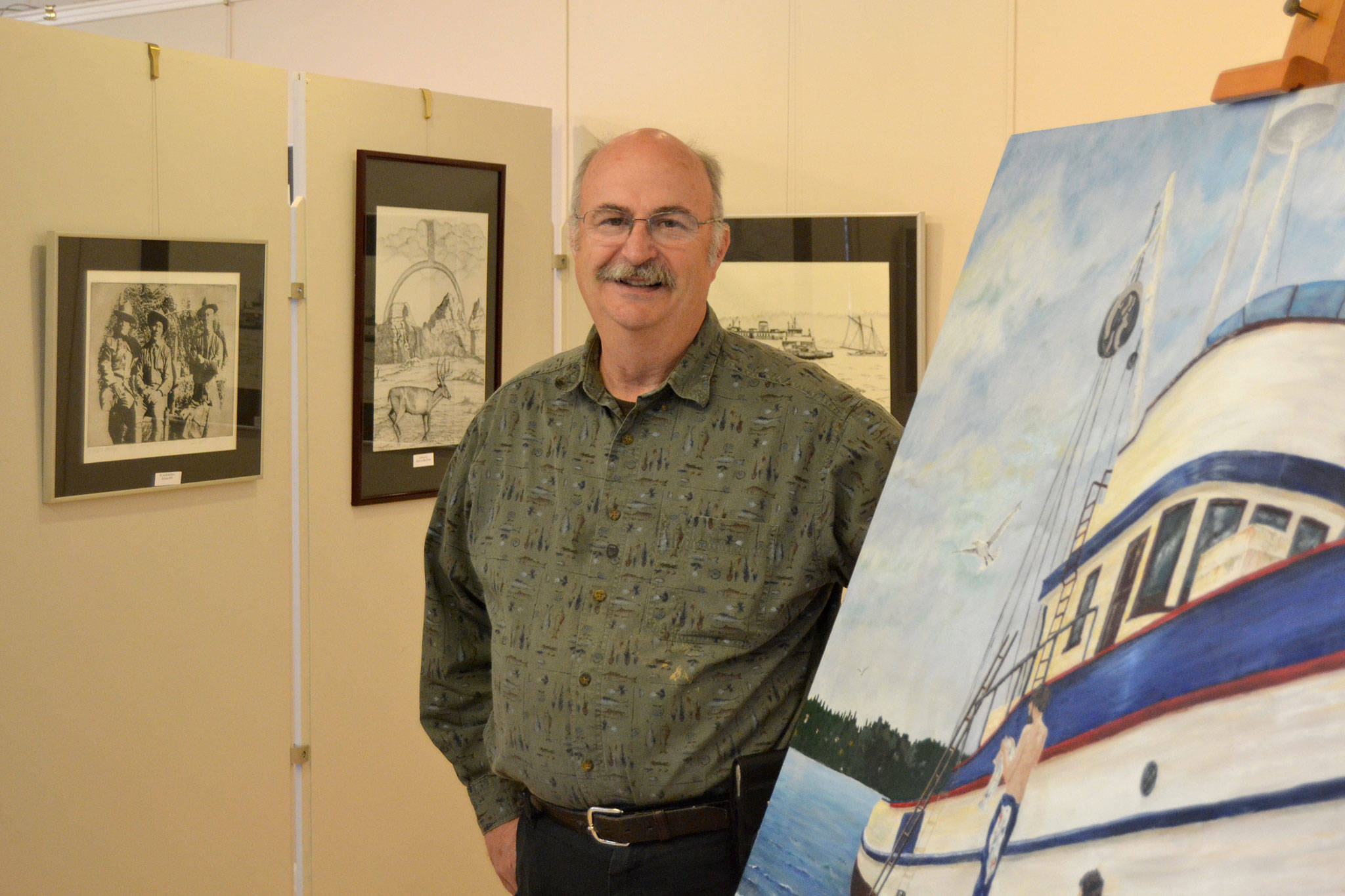 After retiring in 2015 as fire chief for Clallam County Fire District 3, Steve Vogel turned his attention to art, volunteering and writing. His first art show is on display through April 28 at the Sequim Museum and Arts Exhibit Center. Sequim Gazette photo by Matthew Nash