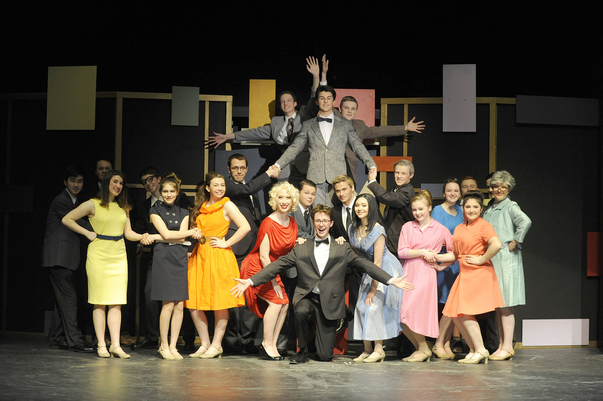 The cast of Sequim High School’s “How to Succeed in Business Without Really Trying” preps the show for three weekends worth of staged satire. Sequim Gazette photo by Erin Hawkins