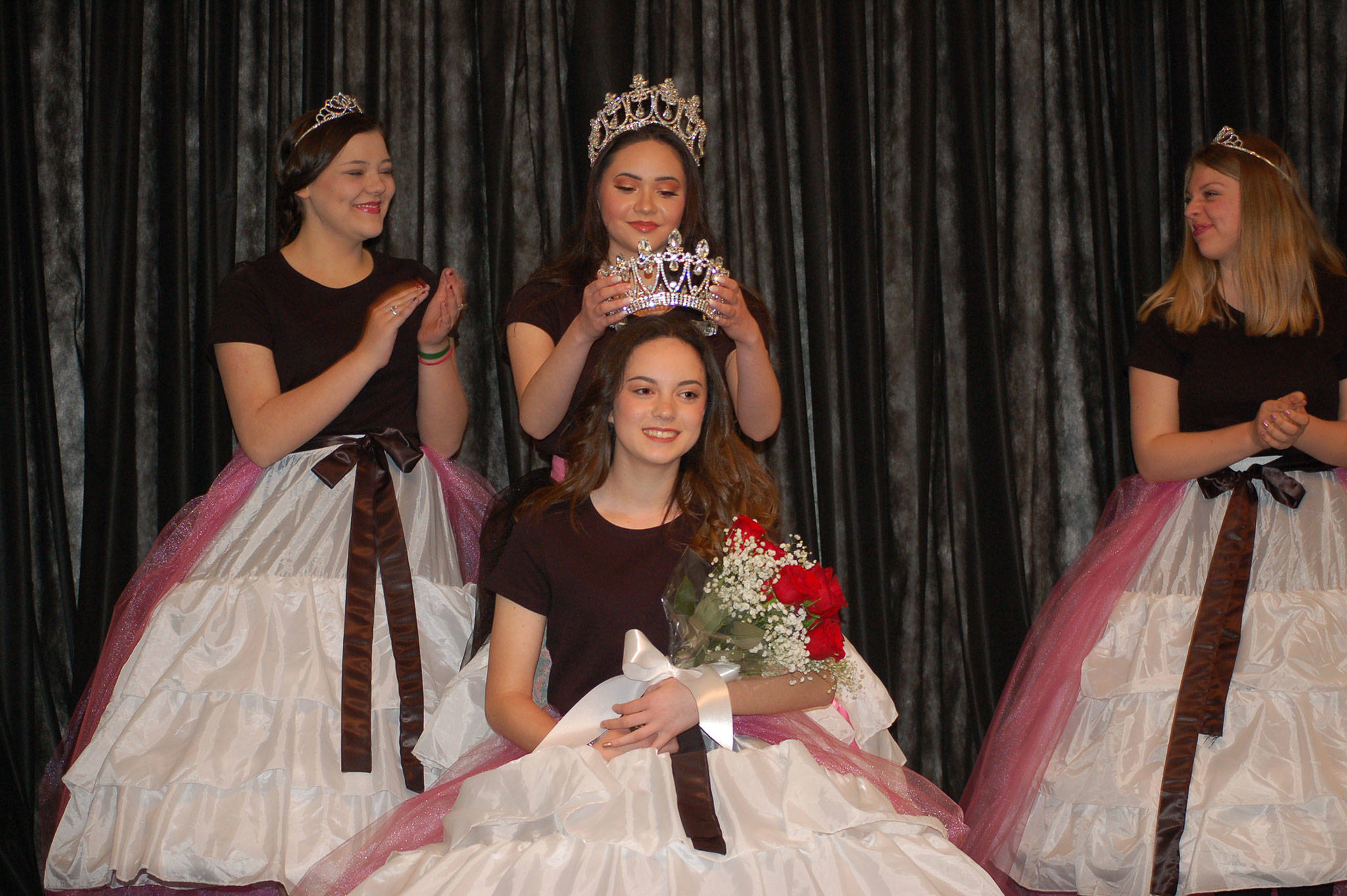 Princess Liliana Williams (foreground) was crowned at the Crazy Daze breakfast by Queen Erin Gordon, center, and joins Princesses Gabi Simonson, left, and Gracelyn Hurdlow on the 2018 Irrigation Festival Royalty Court. Sequim Gazette photo by Erin Hawkins