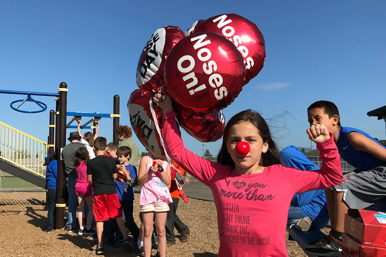 Sequim Boys Girls Club youths wear red noses for cause