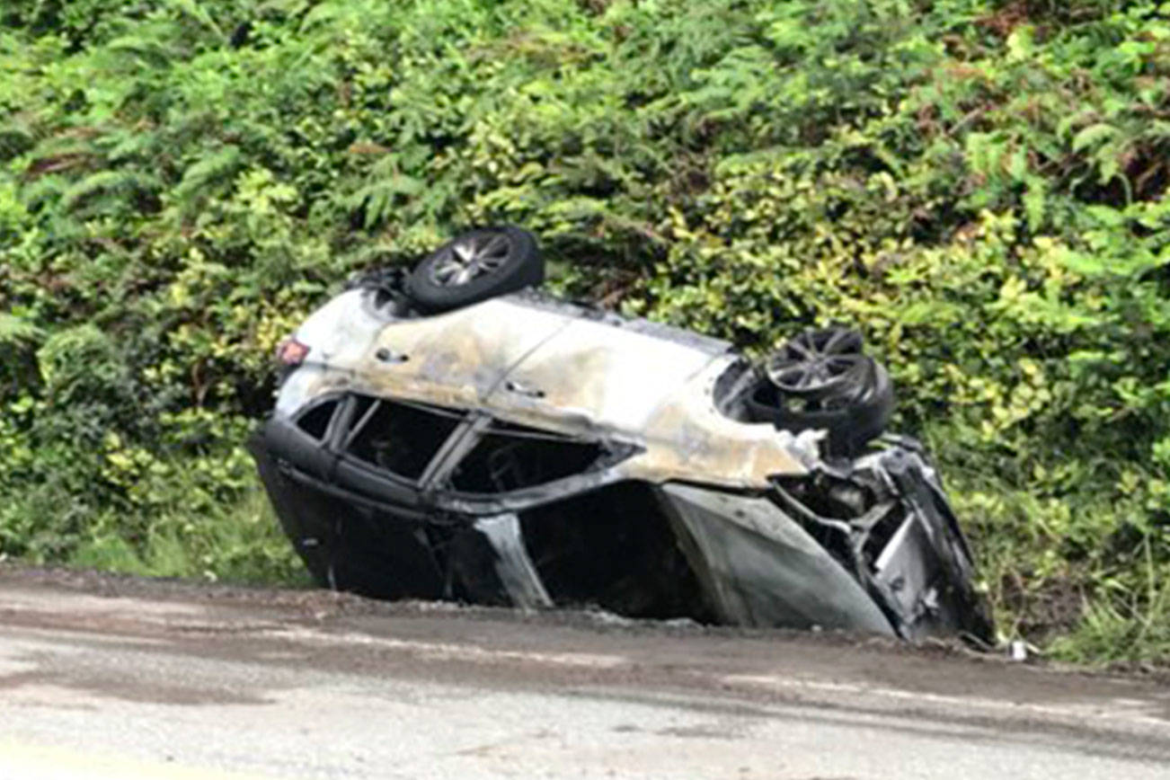 Four escape with minor injuries after wreck, vehicle fire near Sequim