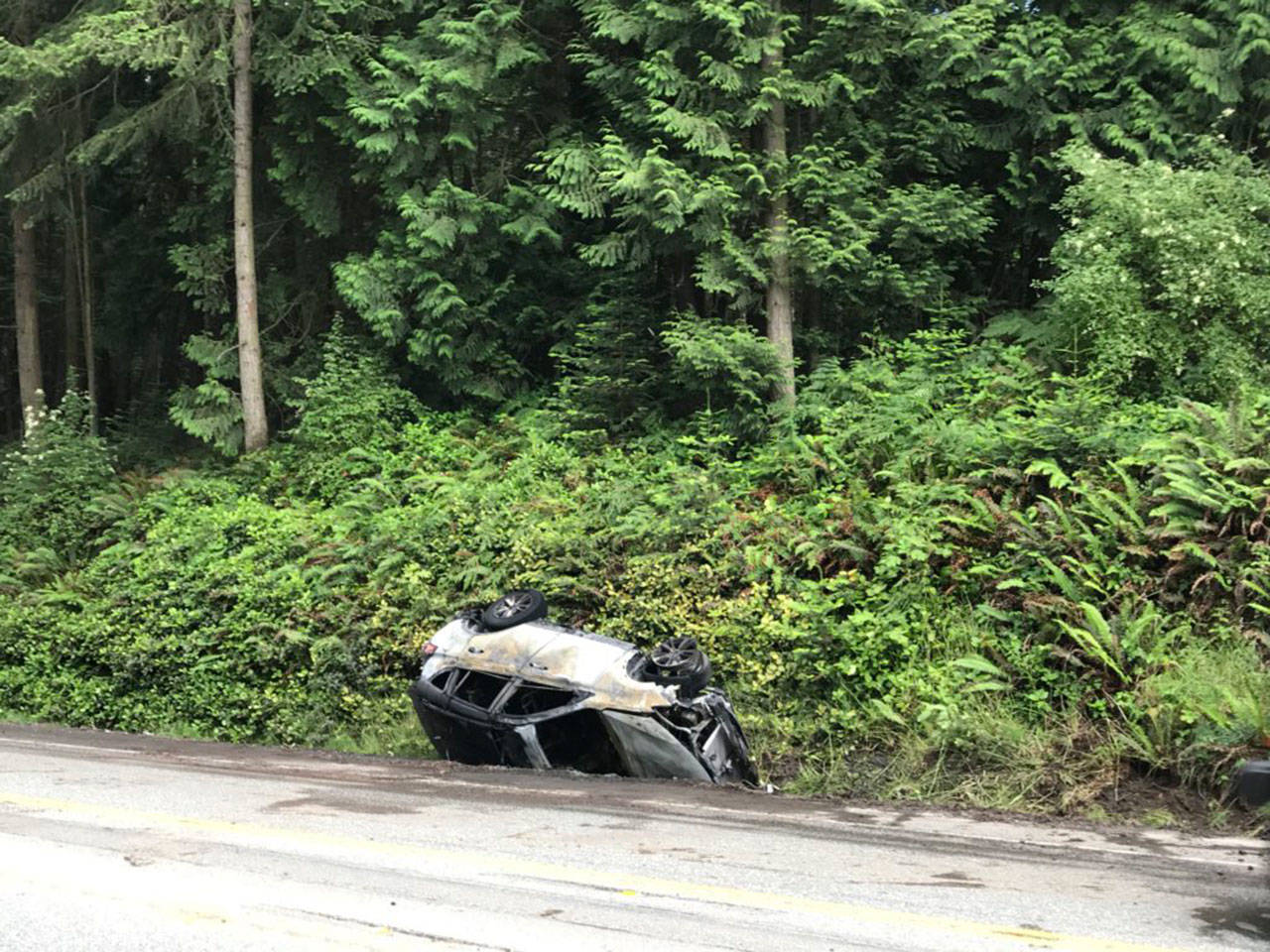 A single-vehicle rollover wreck blocked U.S. Highway 101 on Sunday afternoon. (Clallam County Fire District No. 3)