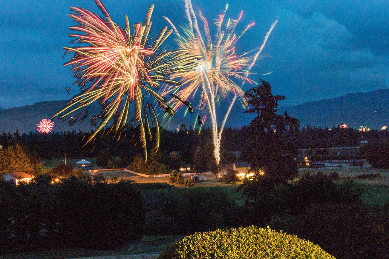 Bob Lampert compiles a few photos over a 20 minute span looking down into the City of Sequim from the Woodland Heights on the Fourth of July.