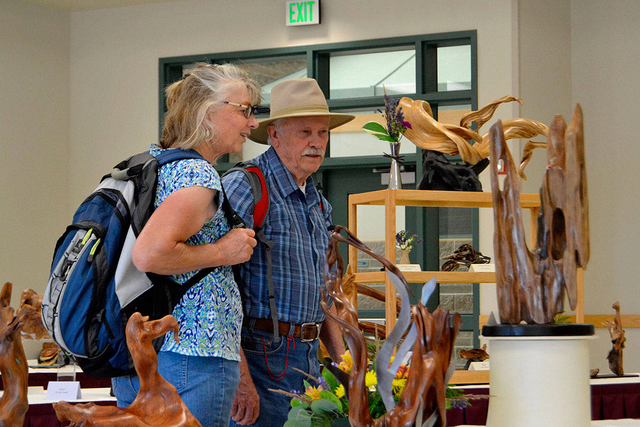 Driftwood sculptors celebrate 10 years with Lavender Art Show