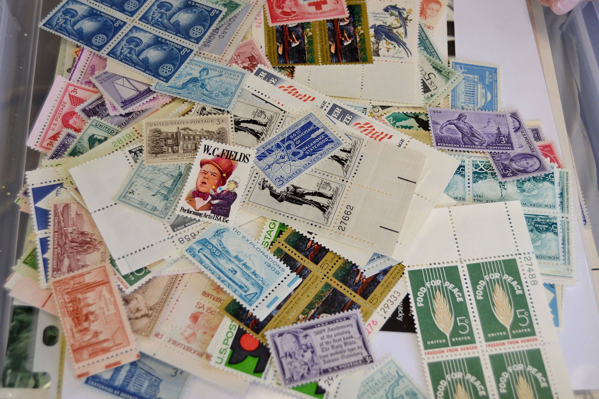 Henry Jones creates a “My Post Office” assortment of collector’s stamps totaling about $50 in mailable stamps. He plans to auction off the collections at the Rotary Club of Sequim’s Salmon Bake on Aug. 12 at the Sequim Boys & Girls Club. Sequim Gazette photo by Matthew Nash