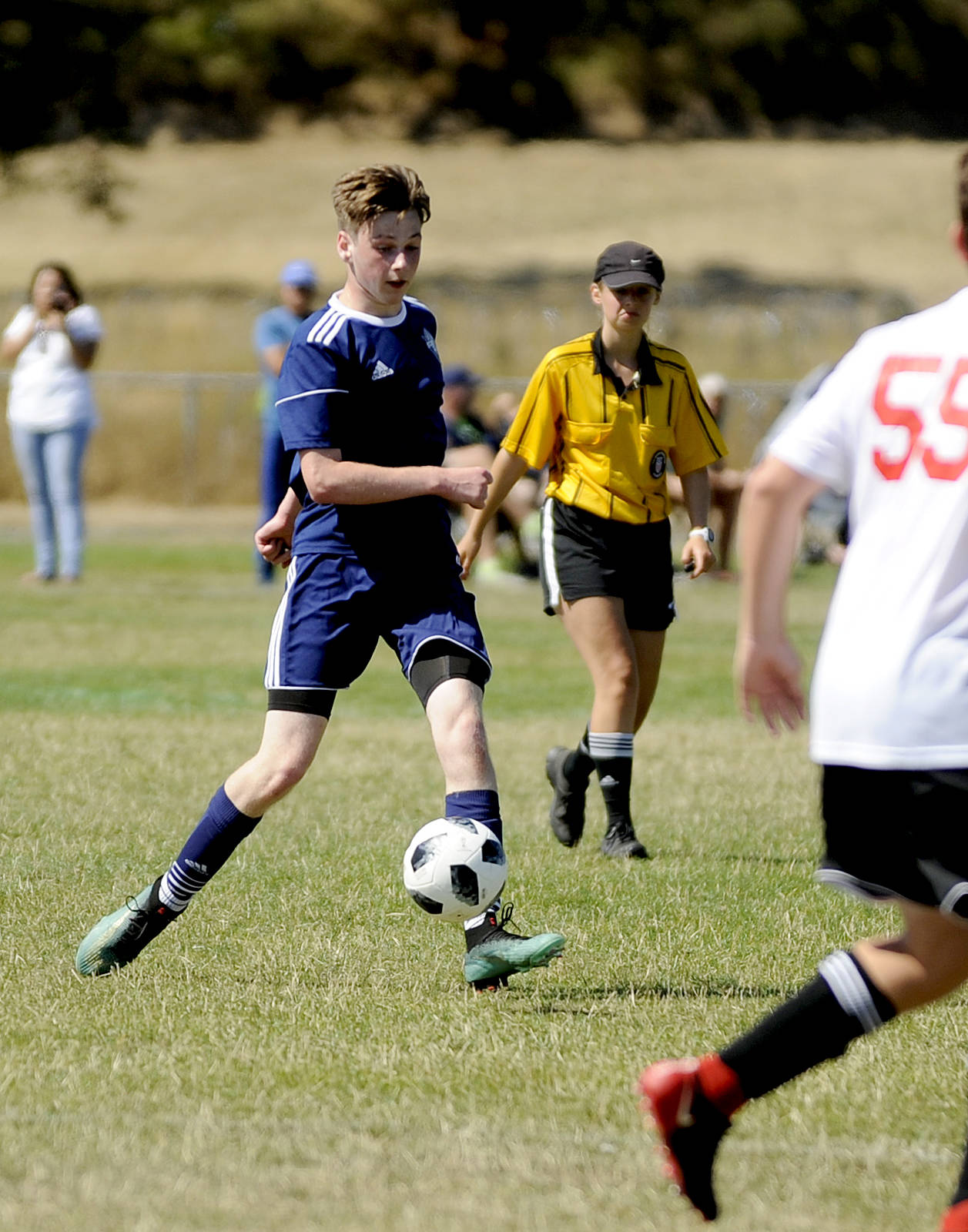 Porter Little and Storm King BU16 takes on the Nortac Sparta B03 squad at last weekend’s Dungeness Cup. Sequim Gazette photo by Michael Dashiell