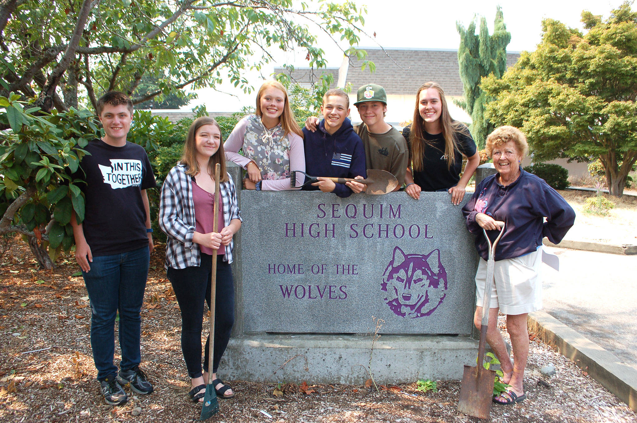 Students and volunteers are gearing up to provide a campus cleanup of Sequim High School from 8 a.m.-3 p.m. on Saturday. Aug. 18. From left, Sequim High School students Liam Braaten, Payton Sturm, Emily Bundy, Nicholas DAmico, Hunter Wells, Katie Potter and volunteer Emily Westcott go over details of this weekends cleanup. Westcott says volunteers will meet in the high school parking lot, can volunteer for any amount of time he or she would like and beverages and snacks will be provided. Sequim Gazette photo by Erin Hawkins