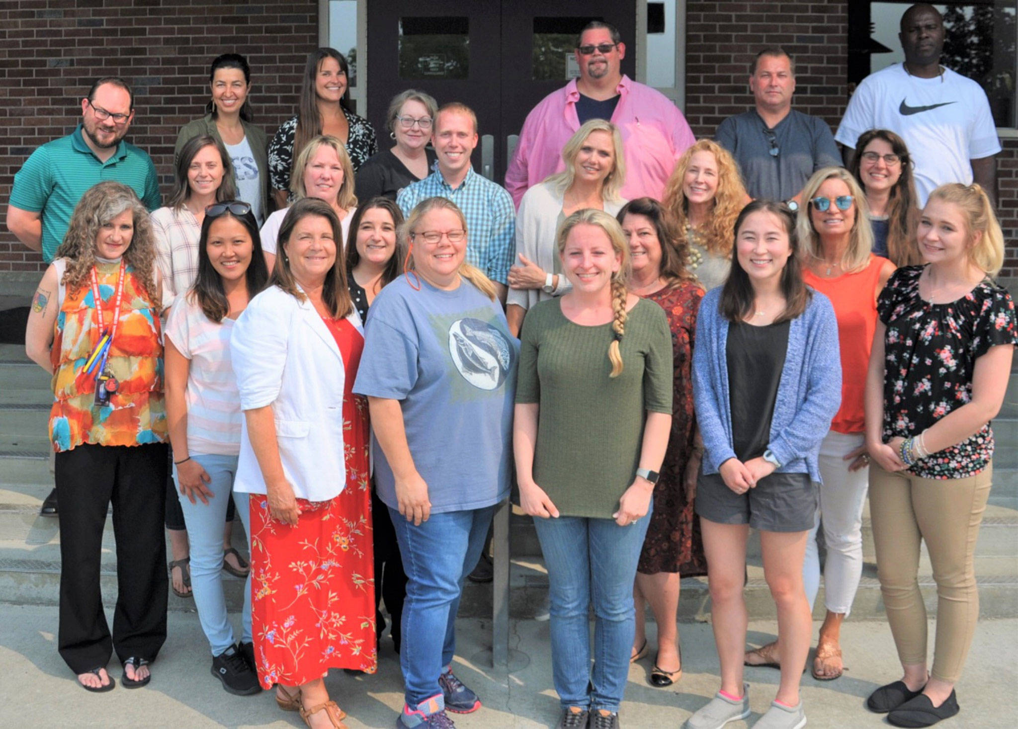 Led by Sequim School District facilitator Pam Landoni (from row, far left, the Sequim School District welcomes new staffers for the 2018-2019 school year. They include (back row, from left) Casey Lanning, Greywolf Elementary School; Alla Bess, Sequim School District; Renee Colwill, Helen Haller Elementary School; Kathryn Baulch, Helen Haller Elementary; George Rodes, Sequim Middle School; Bill McFarlen, Sequim High School; and Joclin Julmist, Helen Haller Elementary; (third row, from left) Amanda Murphy, Greywolf Elementary; Nachelle Jannetti, Helen Haller Elementary; Joey Marcey, Helen Haller Elementary; Kristi Schmeck, Sequim Middle School; Marie Claire Bernards, Helen Haller Elementary; and Ashley Kramer, Greywolf Elementary; (second row, from left) Jennifer Thatcher, Helen Haller Elementary; Melissa Sagara, Helen Haller Elementary; Doreen Minard, Helen Haller Elementary; Linda Jacobson, Greywolf Elementary; and Brooke Hoefler, Helen Haller Elementary; with (first row, from left) Landoni; Lorrie Corder, Helen Haller Elementary; Johanna Mitchell, Sequim Middle School; Jasmine McMullin, Helen Haller Elementary; and Lora Rudzinski, Greywolf Elementary School. Not pictured are Leanne Felts and Norma Graham. Photo by Hanna Smith/Sequim School District