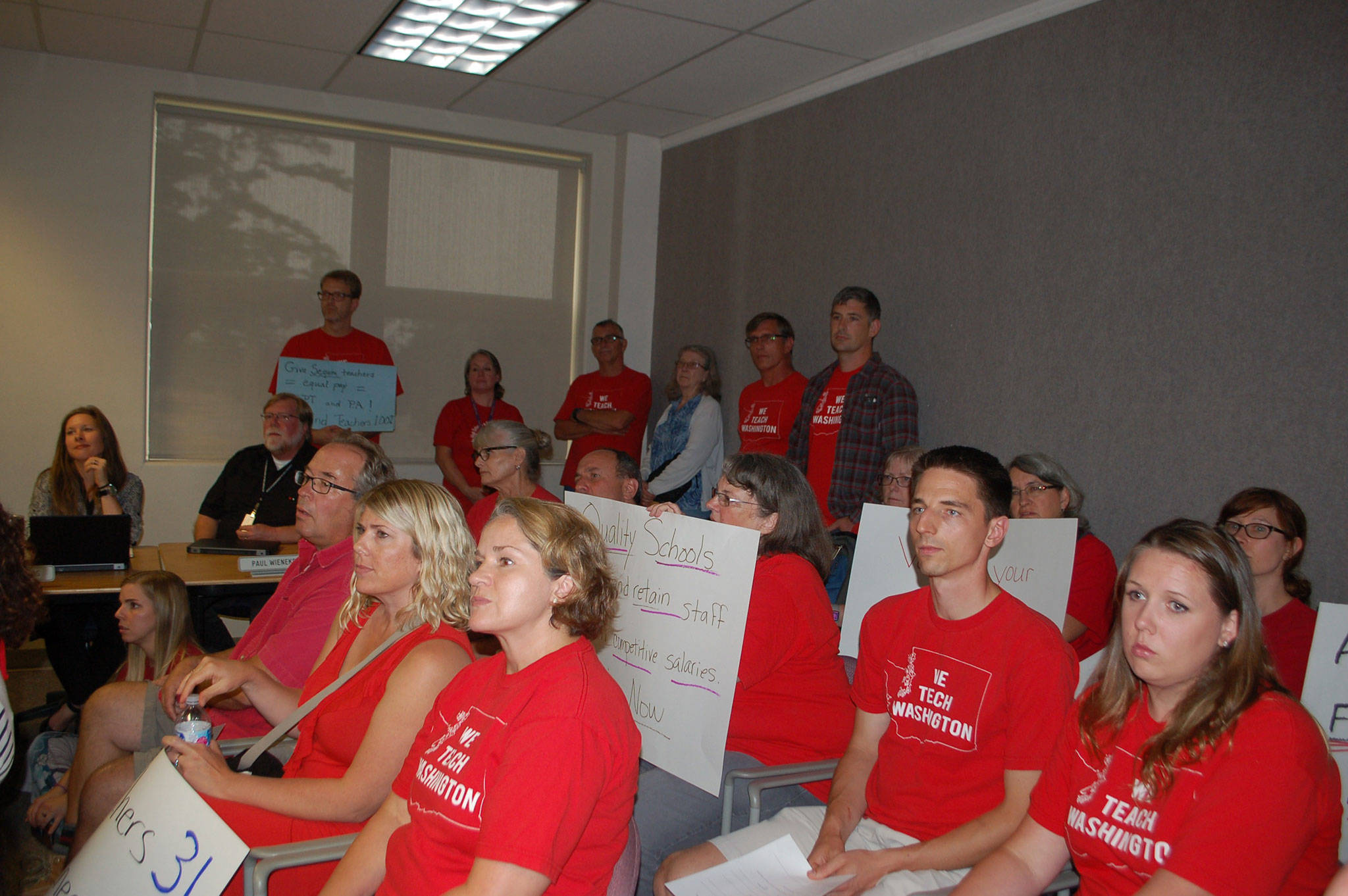 The Sequim Education Association ratified their new contract with Sequim School District on Aug. 29 with a 98 percent approval rate. Last year, teachers lobbied for salary increases at the district boardroom and wore red shirts in solidarity. Teachers did not lobby or strike this year. Sequim Gazette file photo by Erin Hawkins