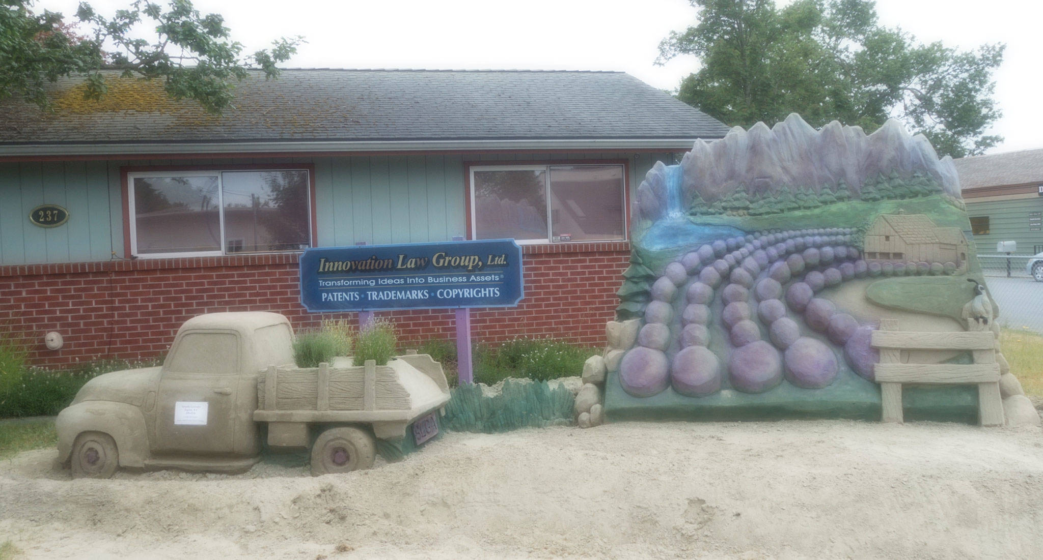 Local sand sculpting artist Kali Bradford carved a sand sculpture of a blooming lavender field and the attendant farm truck for Sequim Lavender Weekend in 2015 at Jacques Dulin Innovation of Law Building on North Sequim Avenue. Submitted photo.