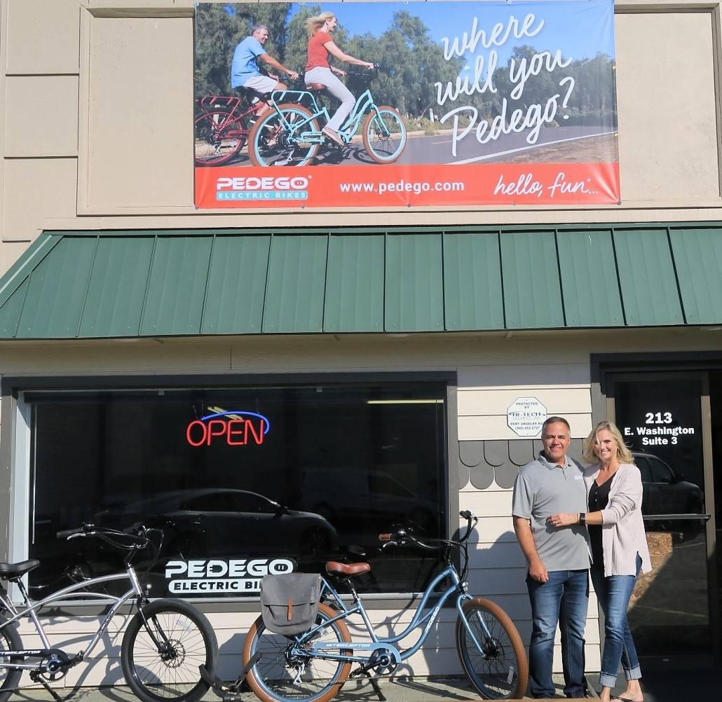 Garth and Kristi Schmeck moved to Sequim about a month ago after forest fires forced them to move sooner than expected to the area from California. The couple owns Pedego Sequim, which Garth manages and Kristi teaches math at Sequim Middle School.                                 Photos courtesy of Pedego Electric Bikes