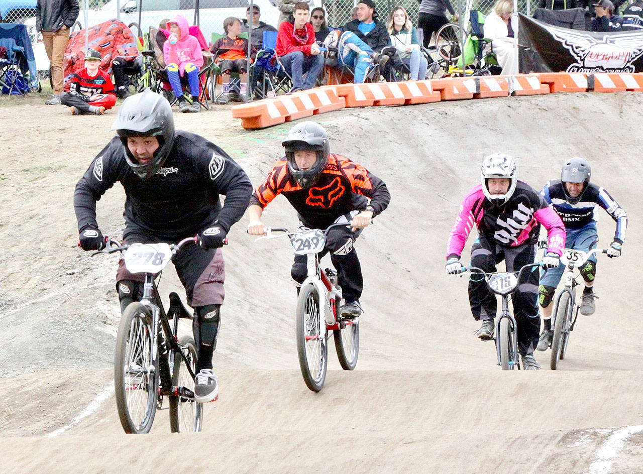 Ken Barley (278) from Bremerton is in the lead in the 40-45 Cruiser division at the Washington State BMX championships held at the Lincoln Park BMX track in Port Angeles on Sunday. Trailing are Shawn Bowers (249) from Spokane, Casey Cramer (15) from Des Moines Joseph Balsiger (35) from Bellingham. (Dave Logan/for Peninsula Daily News)