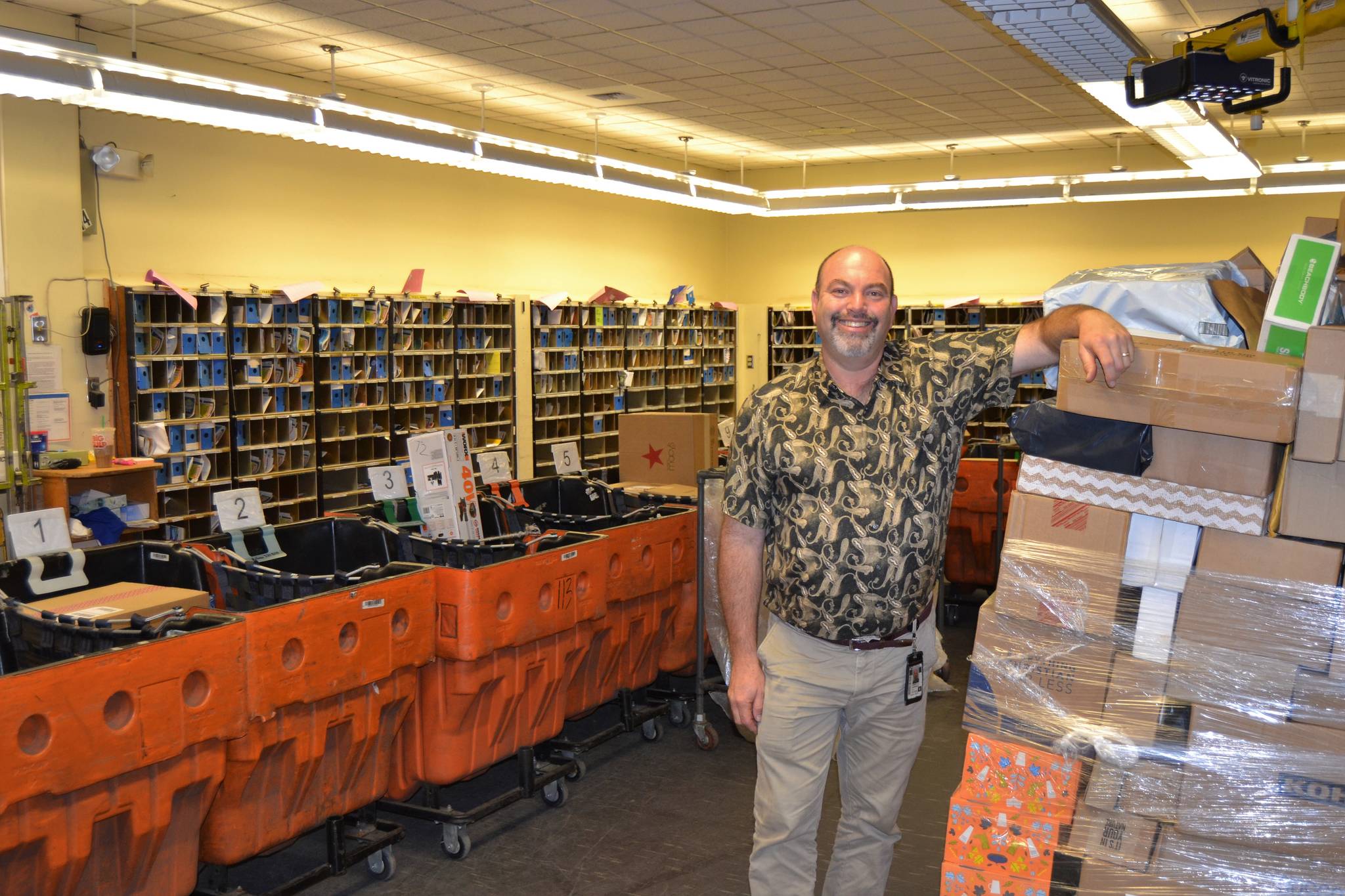 Sequim Postmaster Rob Garfinkle oversees about 15,000 residents’ mail through the Sequim Post Office. “The people here have been great here,” he said. “This is a great team and I’m glad to be part of it.” Sequim Gazette photo by Matthew Nash