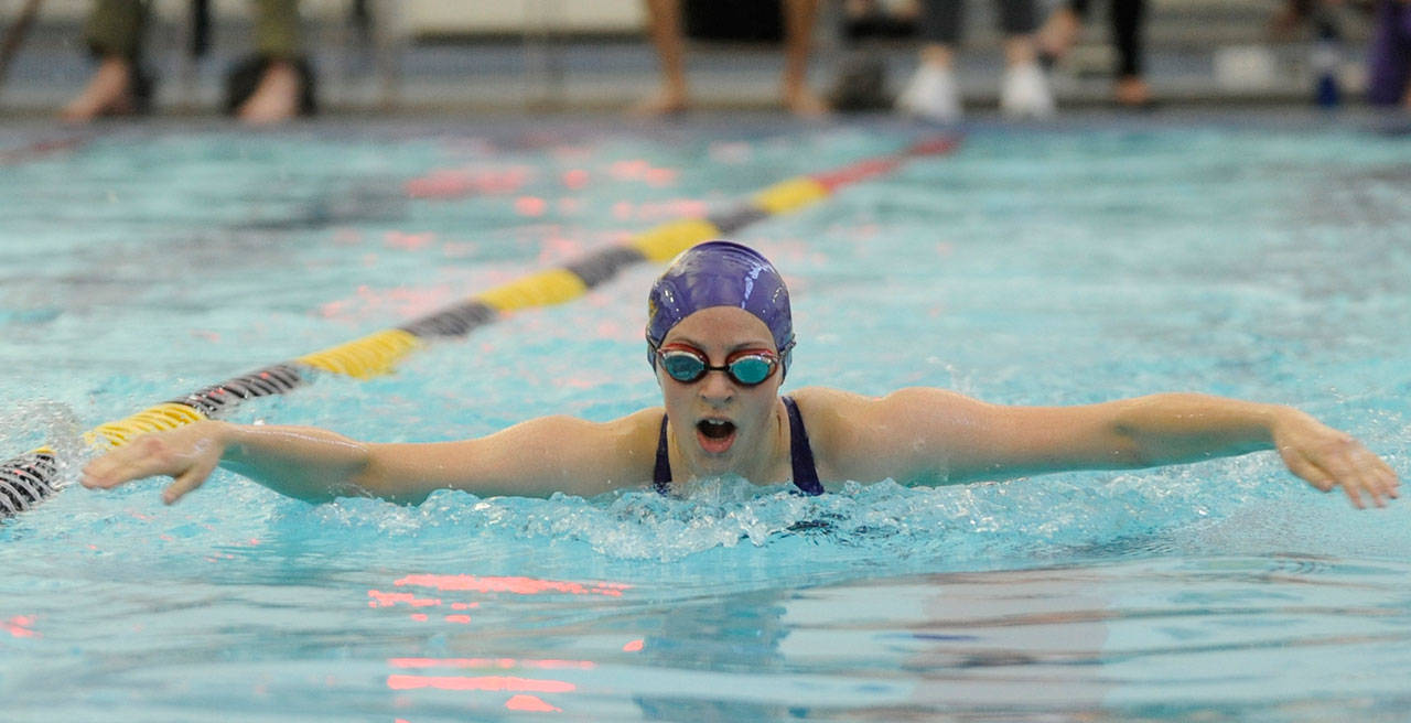 Girls swimming: Wolves set bevy of bests in league meet