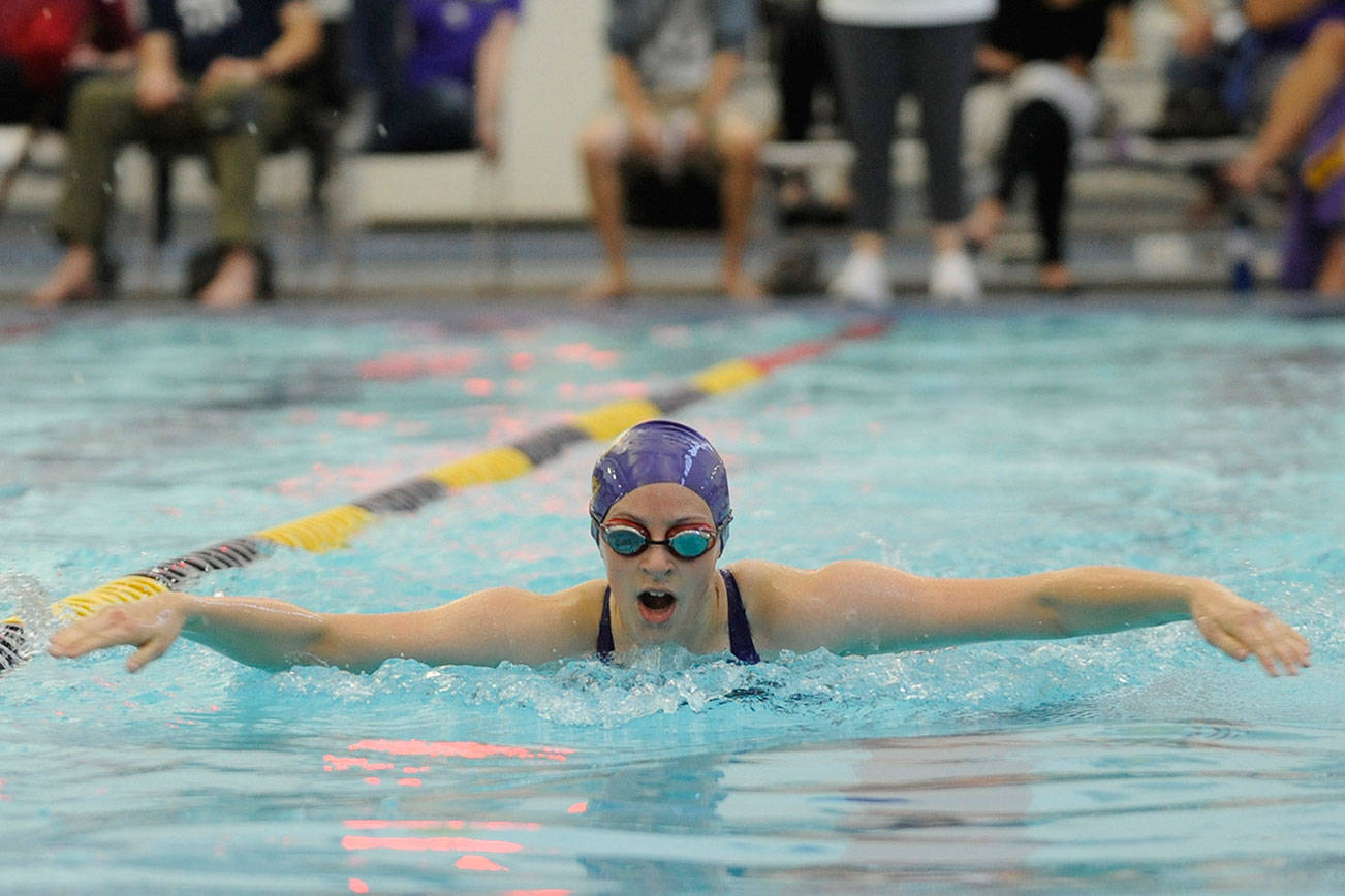Girls swimming: Wolves set bevy of bests in league meet