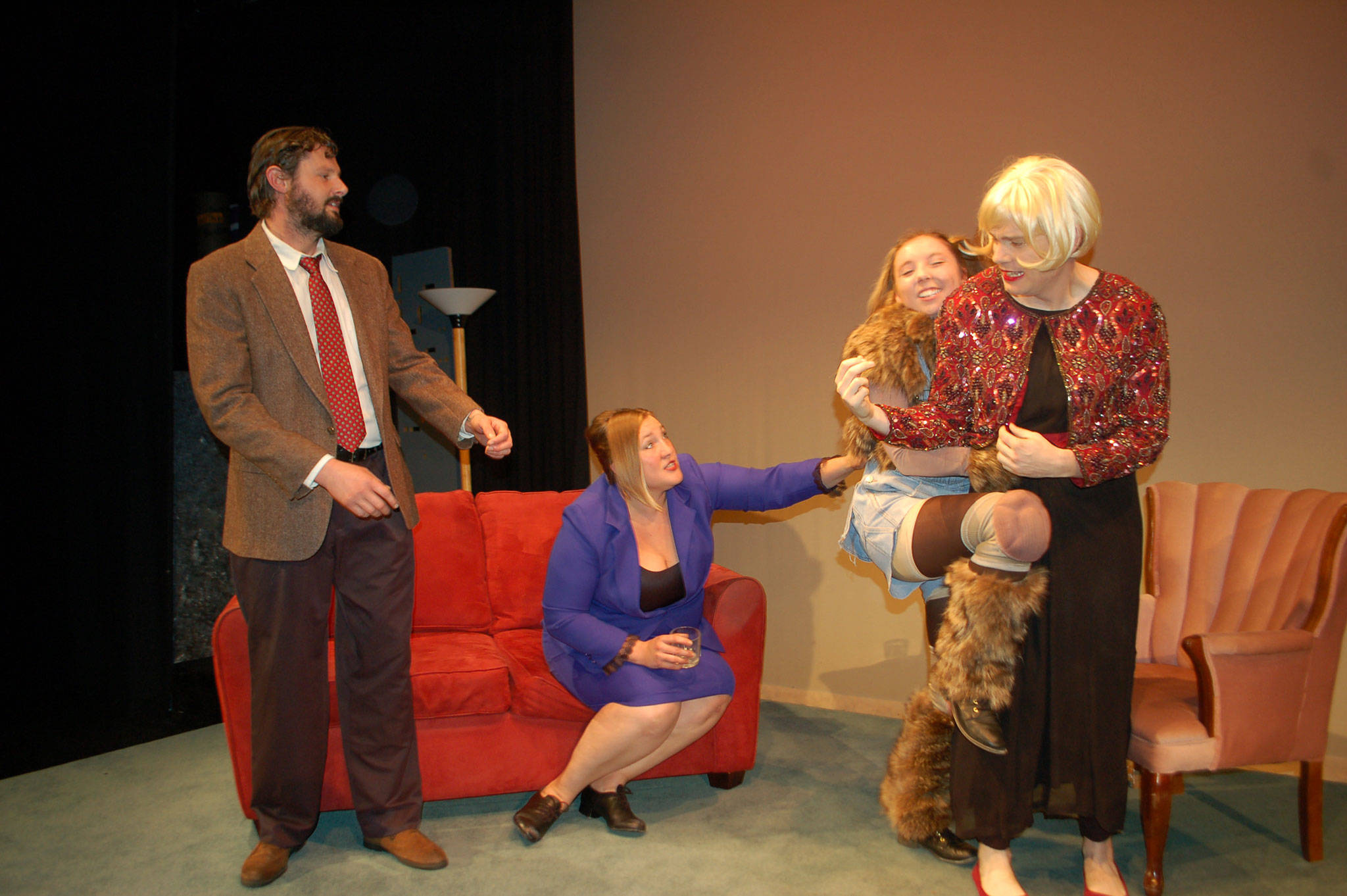 The cast of Olympic Theatre Art’s production of “Sylvia” from left, Edwin J. Anderson III, cast as Greg, Jennifer Horton, cast as Greg’s wife Kate, Melissa Karapostoles, cast as the dog Sylvia, and Michael Sickles, cast as several characters, including a dog enthusiast, friend of Kate’s, and gender ambiguous therapist, rehearse a scene from the show that premieres on Friday, Oct. 19. Sequim Gazette photo by Erin Hawkins
