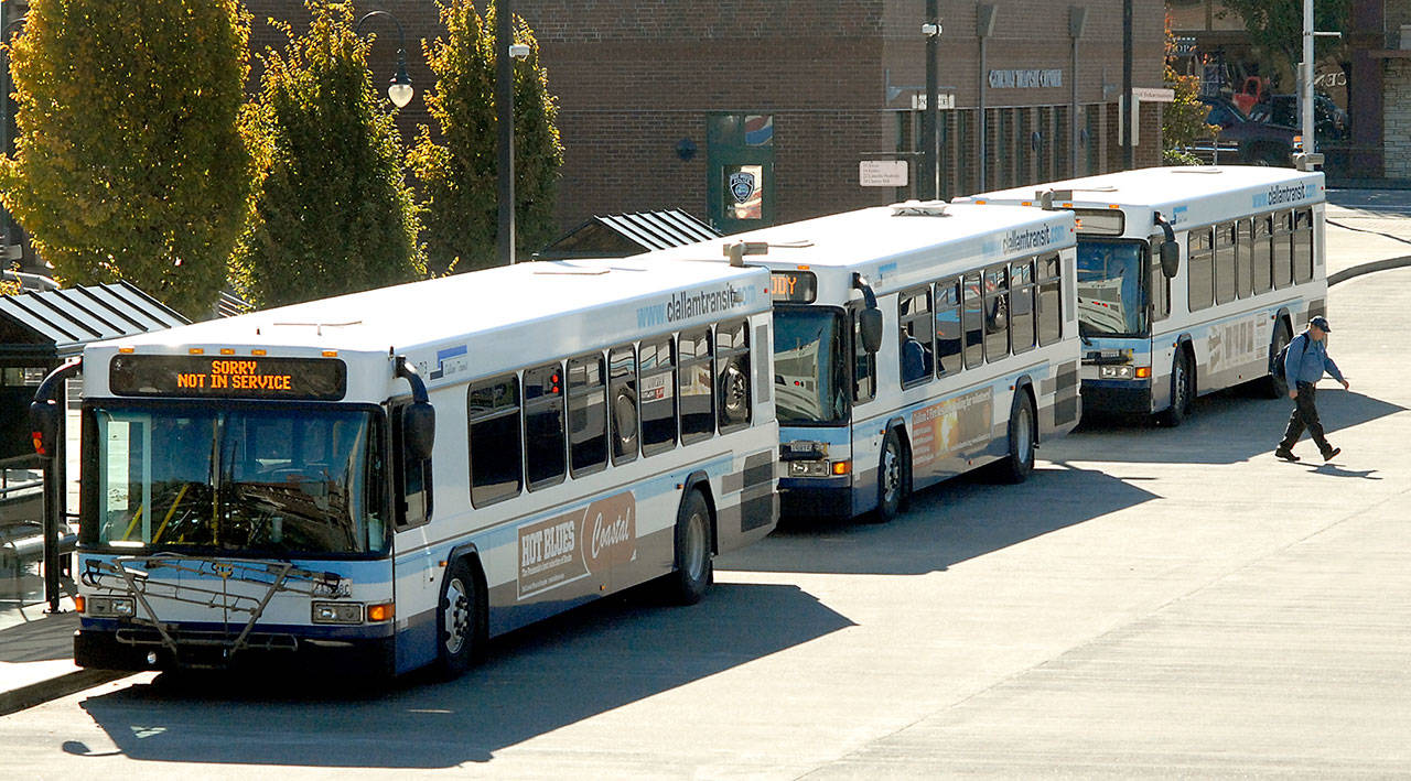 Clallam Transit buses line up to take on passengers at The Gateway transit center in downtown Port Angeles on Tuesday. Photo by Keith Thorpe/Peninsula Daily News