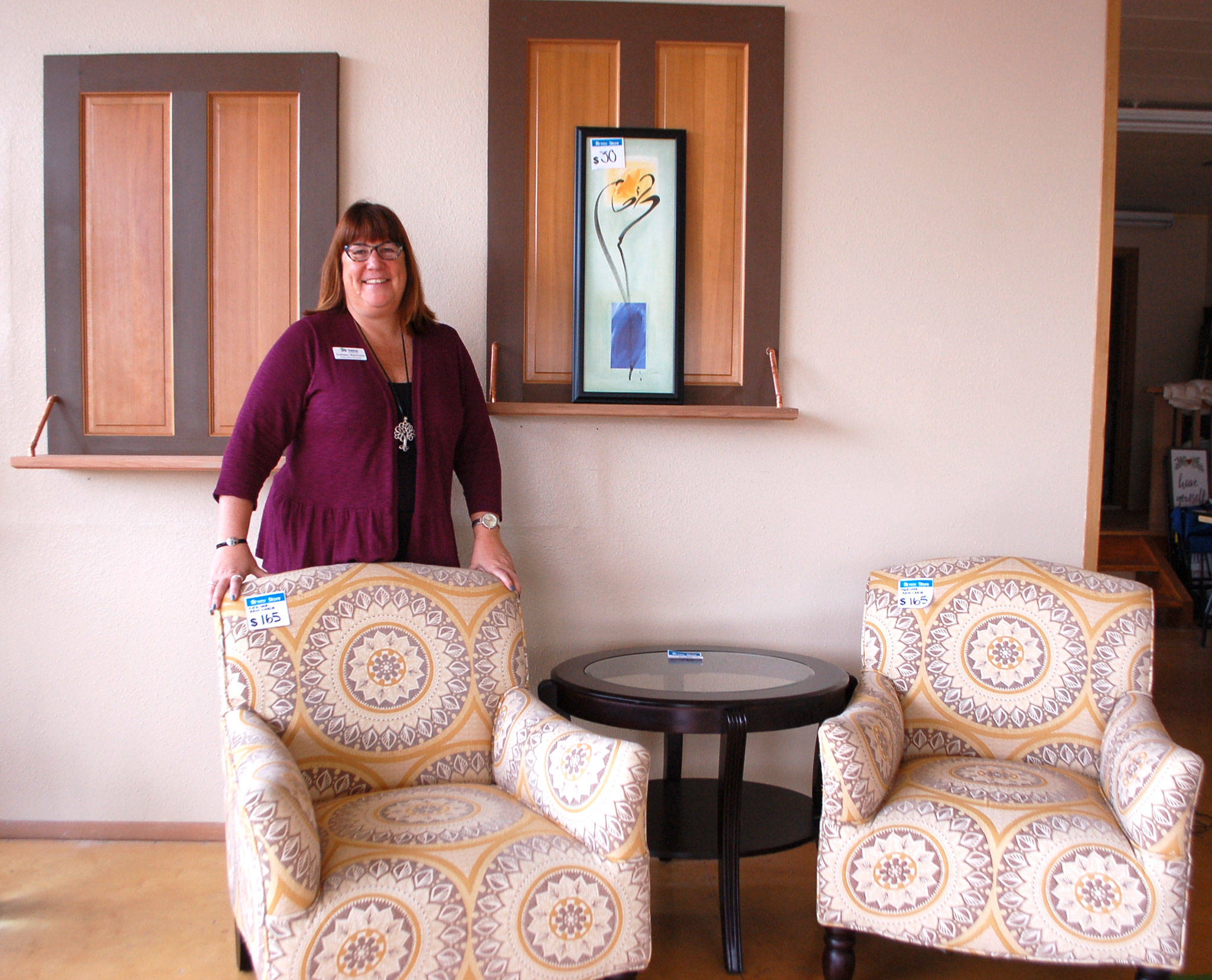 Colleen Robinson, executive director of Habitat for Humanity of Clallam County, stands in the nonprofit’s new vintage boutique in Sequim where staff also moved its main Sequim office. The new store is set to tentatively open sometime in mid-November. Sequim Gazette photo by Erin Hawkins