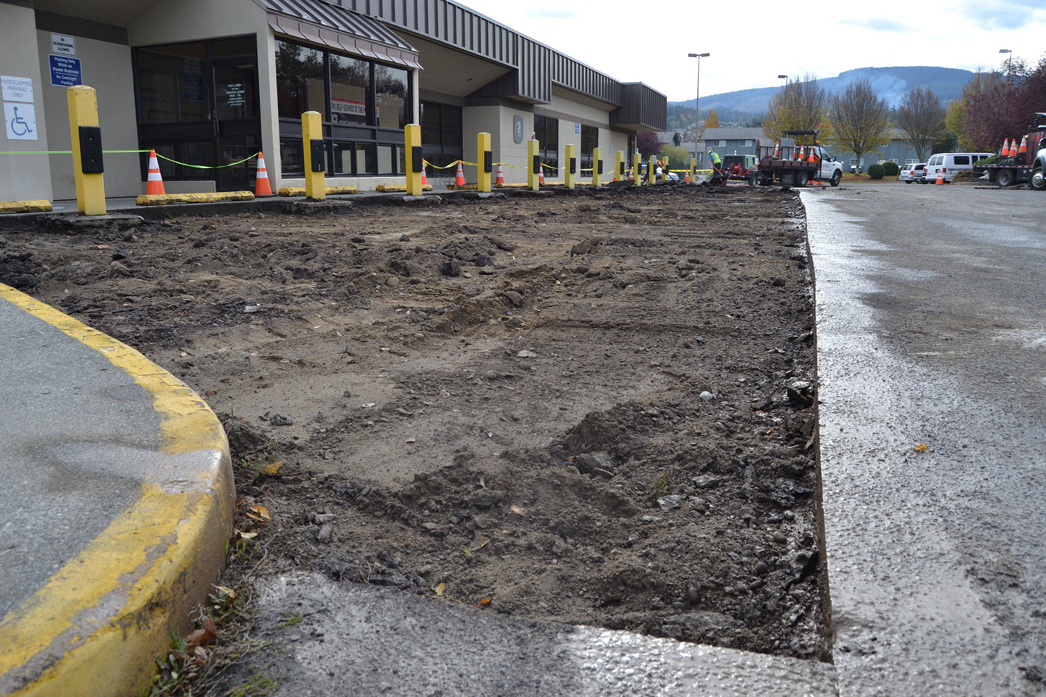 On Oct. 31-Nov. 1, Lakeside Industries resurfaced a portion of the Sequim Post Office’s parking lot that has been deteriorating in recent years. Sequim Gazette photos by Matthew Nash