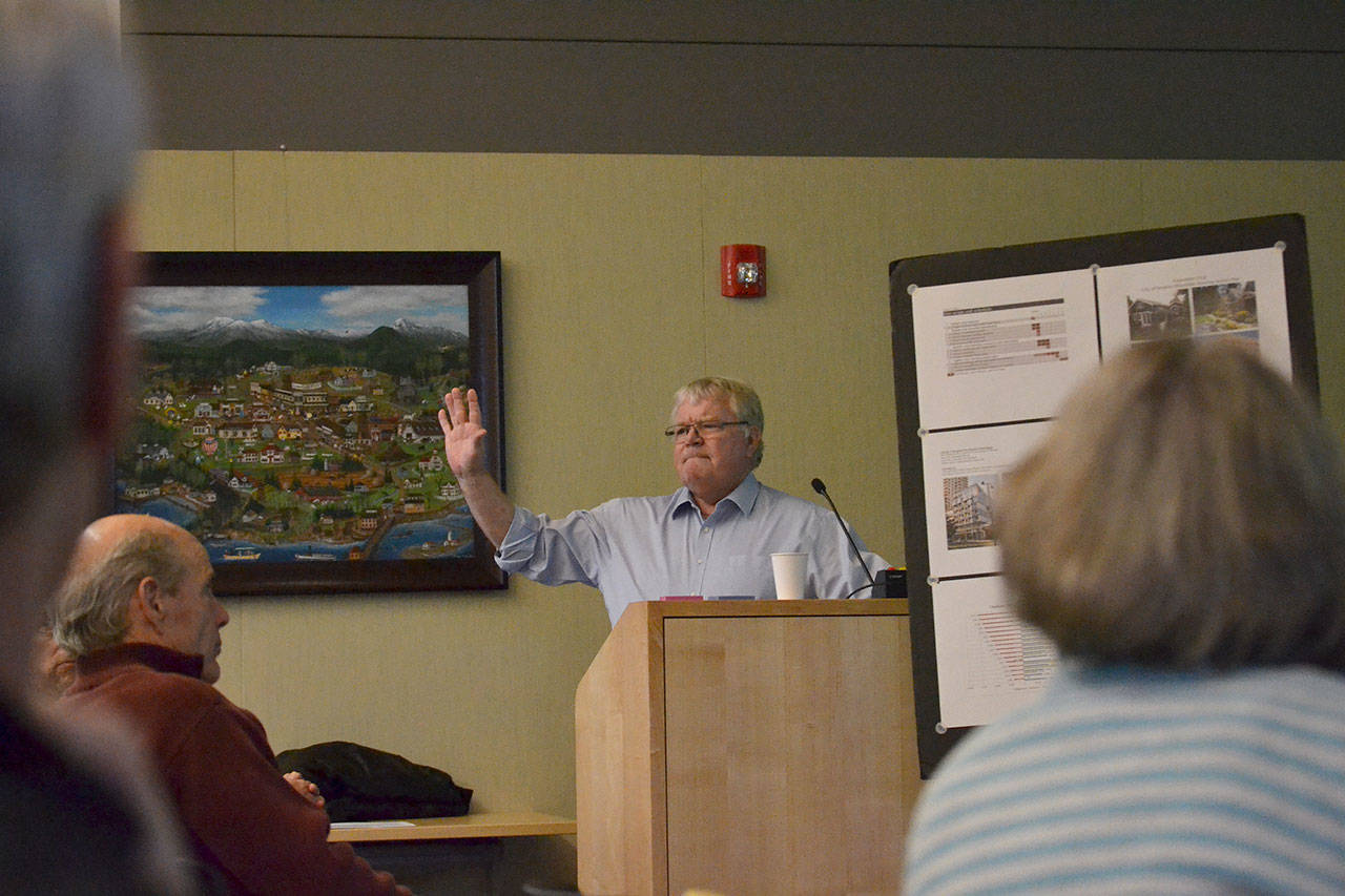 Consultant Tom Beckwith discusses the City of Sequim’s Affordable Housing Action Plan on Oct. 30 before 40 people saying “this is a dynamic tool that affects you every day.” The plan goes before the Sequim Planning Commission and City Council before action tasks could be implemented.