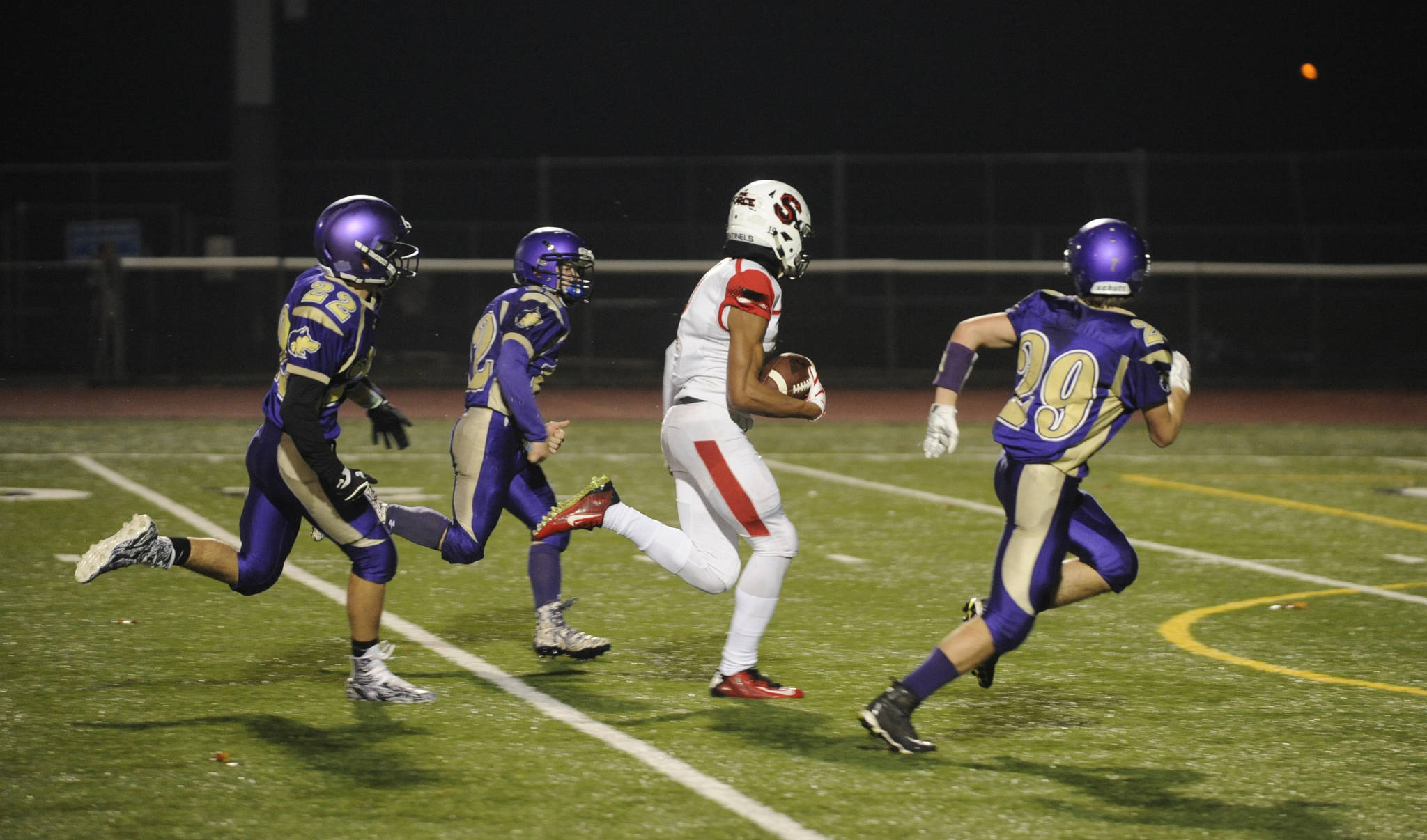 Steilacoom sophomore receiver Emeka Egbuka (2) races through the Sequim defense for one of his three first-half touchdown receptions in a 49-12 rout in Silverdale on Nov. 9. Defending the play are Wolves’ Walker Ward (22), Kyler Rollness (12) and Joey Oliver (29). Sequim Gazette photo by Michael Dashiell