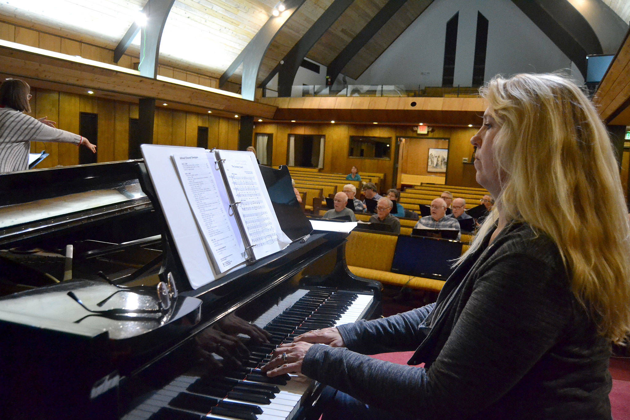 Pianist Kayla Layer accompanies the Sequim Community Christmas Chorus this year. Sequim Gazette photo by Matthew Nash