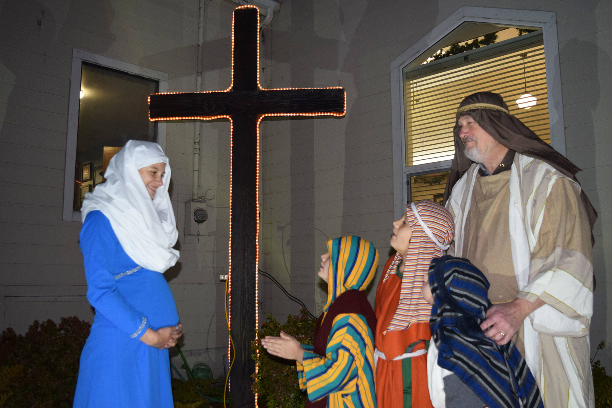 Members of the Sequim Valley Nazarene Church, from left, Melanie Byrne as Mary, with Marcus Byrne, Malachi Byrne, and Gabriel Robbins as shephards, and David Stoeckl, as Isaiah, rehearse for the Church’s living nativity with the first set of tours set for Saturday, Dec. 8 and continues on Saturday, Dec. 15. Sequim Gazette photo by Erin Hawkins