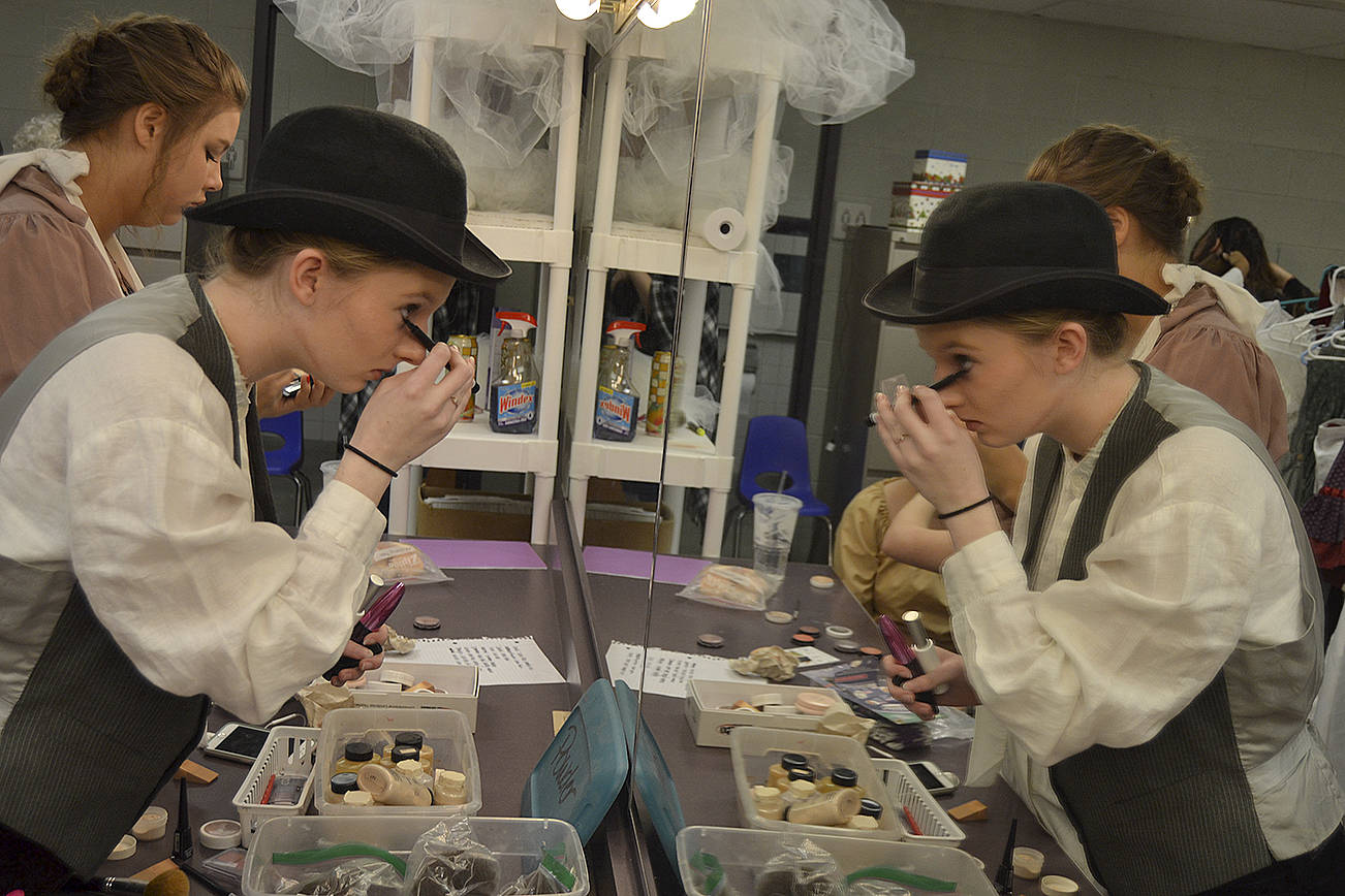 Coral Disinski prepares her makeup for a rehearsal of Sequim High’s “A Christmas Carol.” Sequim Gazette photo by Matthew Nash