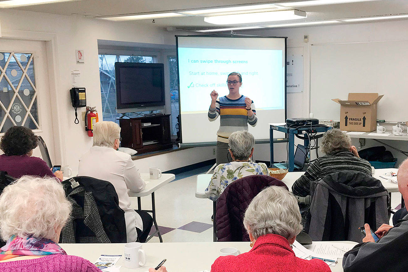 Workshop attendees at Shipley Center in Sequim get cell phone tutorial