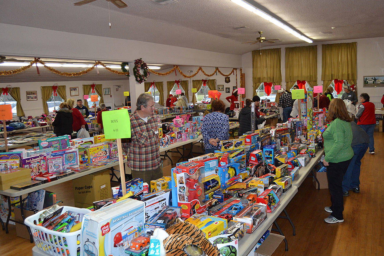 Cavalcade of Christmas cheer: Toys for Sequim Kids brings presents to 350-plus children