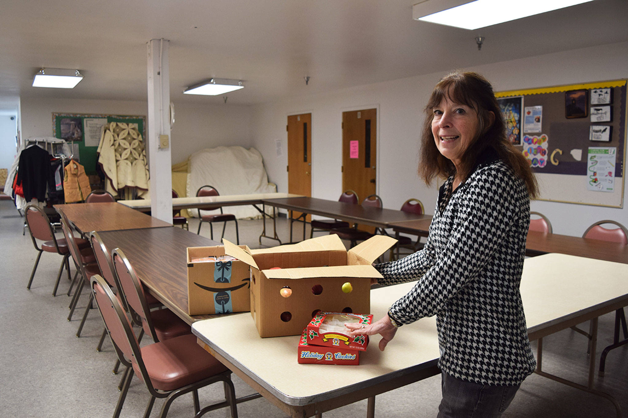 Jean Pratschner, volunteer coordinator for the Sequim Community Warming Center, unpacks donated snacks and goodie bags to give out at the center on Jan. 28. Starting Friday, Feb. 1-Sunday, March 31, the center will be open 9 p.m.-7 a.m. every night. Sequim Gazette photo by Erin Hawkins
