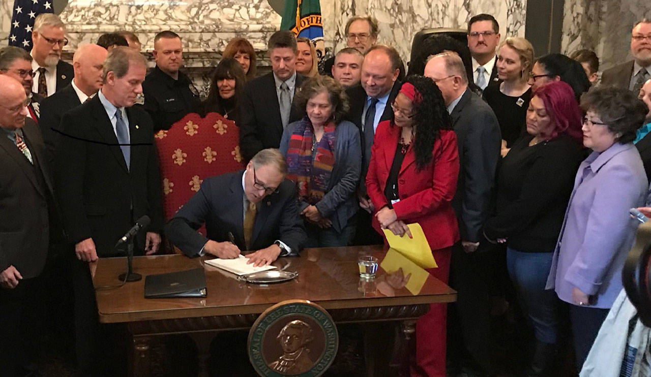 Gov. Inslee signs first bill of legislative session into law