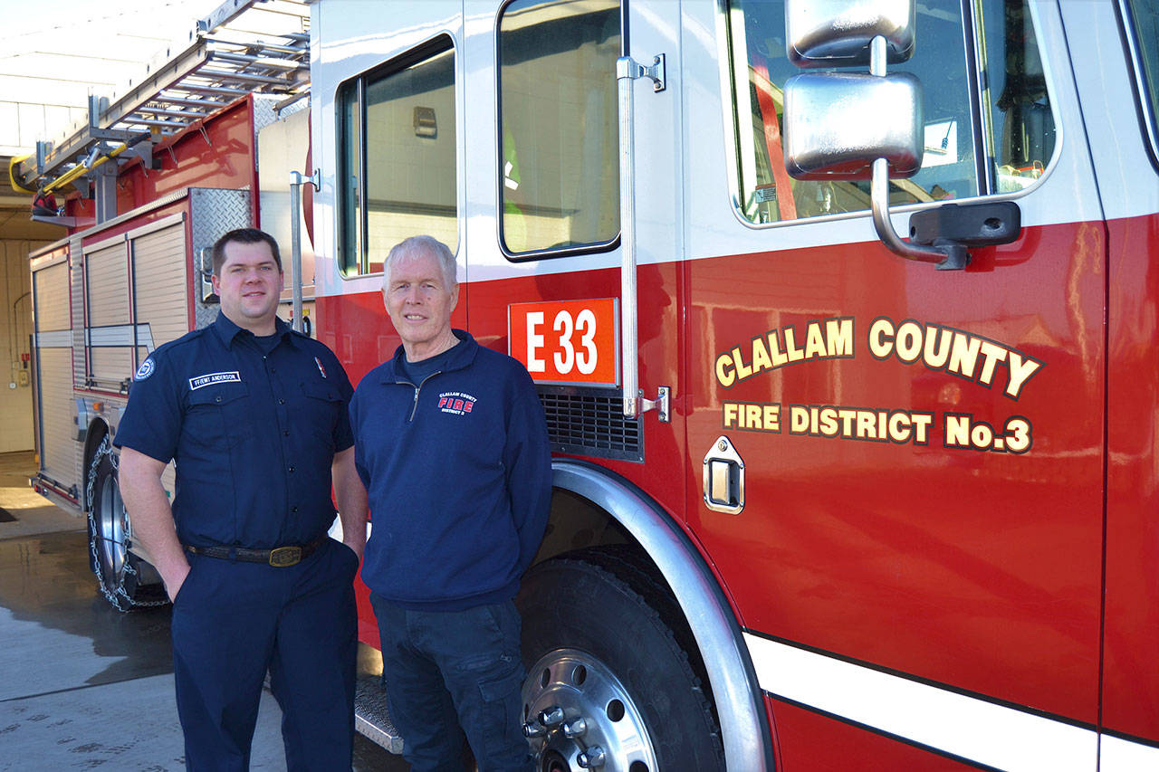 In January, Firefighters/EMTs Travis Anderson, left, and John McKenzie were named Career and Volunteer Firefighters of the Year (2018). They were chosen, fire administrators said, for increasing Clallam County Fire District 3’s professionalism and core values. Sequim Gazette photo by Matthew Nash