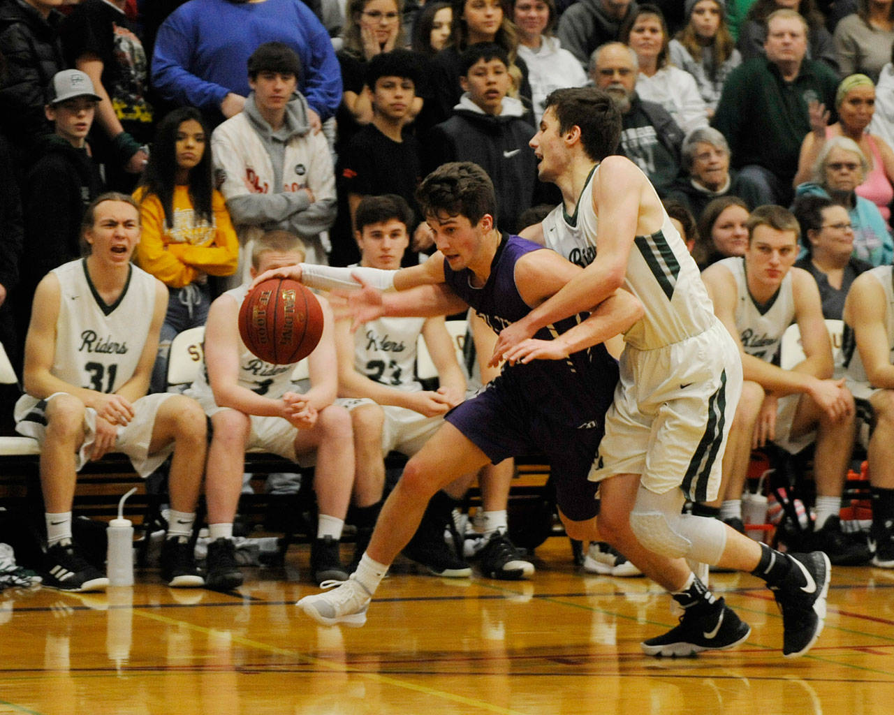 Boys basketball: Roughriders end Wolves’ season with 10-point win in district match-up