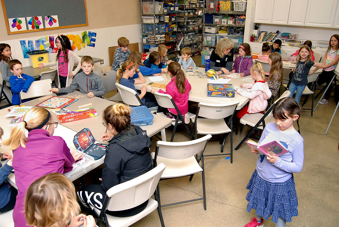 Youngsters in the Clallam County YMCA’s “After the Bell” activities program take part in after-school actvities Tuesday at the Y in Port Angeles. Photo by Keith Thorpe/Peninsula Daily News