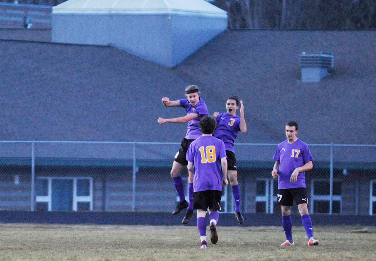 Boys soccer: Host Wolves rout Knights, edge Roughriders