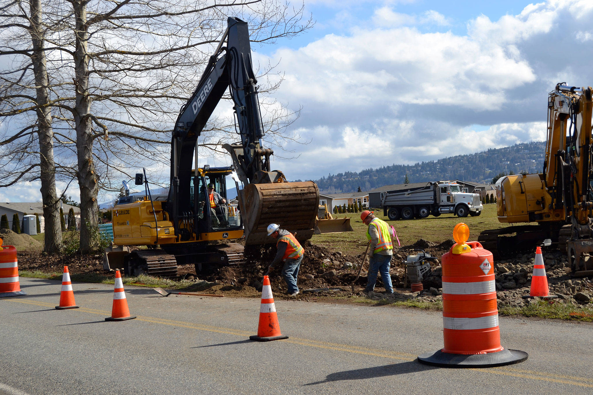 Through April 4, utility crews continue to work on weekdays installing sewer and water pipelines along Hendrickson Road for 57 news homes set to go in under the name Cameron Village. The project features three phases and connects West Hendrickson Road to West Fir Street in Phase 2. Sequim Gazette photo by Matthew Nash