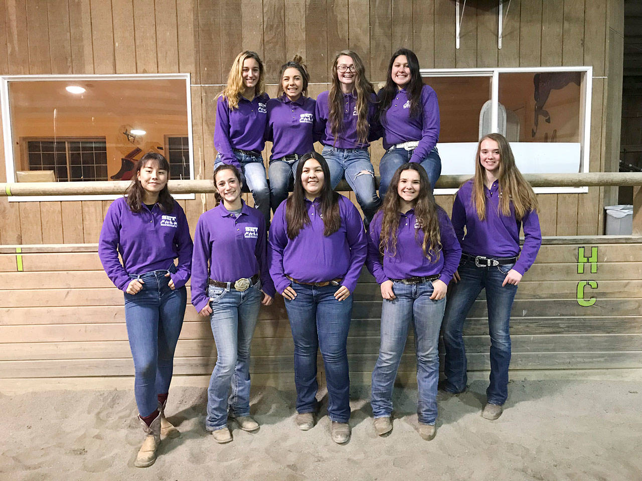 Sequim Equestrian Team members enjoy their first competition of the year in Elma in early March. Team members include (back row, from left) Grace Niemeyer, Miranda Williams, Keri Tucker and Abby Garcia, with (front row, from left) Khelea Cloetens, Yana Hoesel, Lilly Thomas, Abbi Priest and Chloe VanProyen. Submitted photo