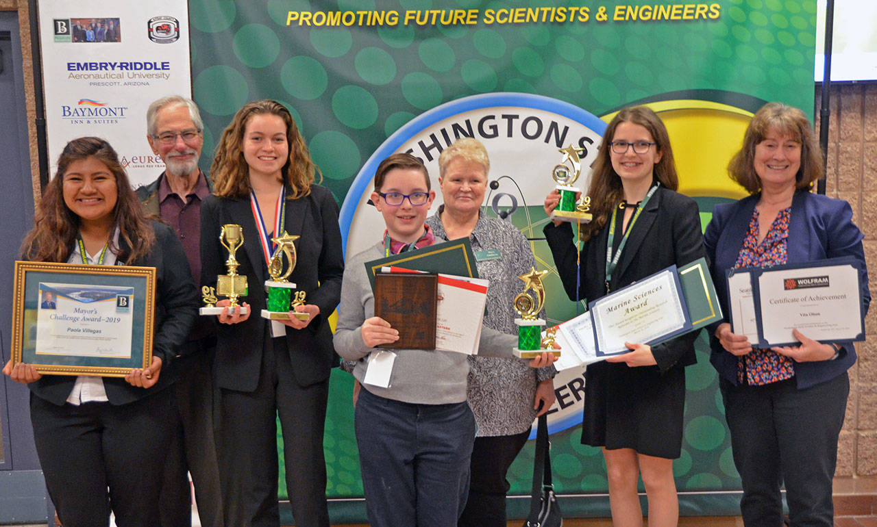 Pictured, from left, are student Paola Villegas, mentor Ron Tognazzini, students Vita Olson and Brody Andersen, mentor Mary Omberg, Karlie Viada and science fair coordinator Debra Beckett. Submitted photo