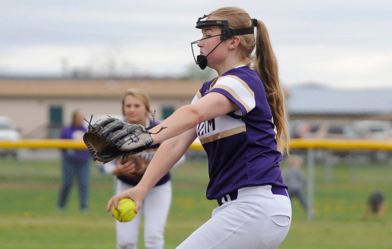 Fastpitch: Trojans rally late, edge Wolves