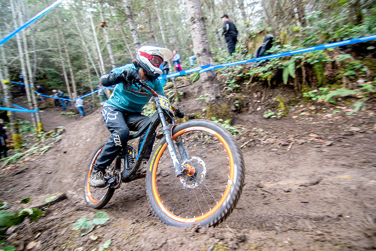 (Jesse Major/Peninsula Daily News) Annie Craig of Orting races at the Northwest Cup at Dry Hill west of Port Angeles on Sunday. Craig finished third in the women’s 19-plus Cat 1 race.